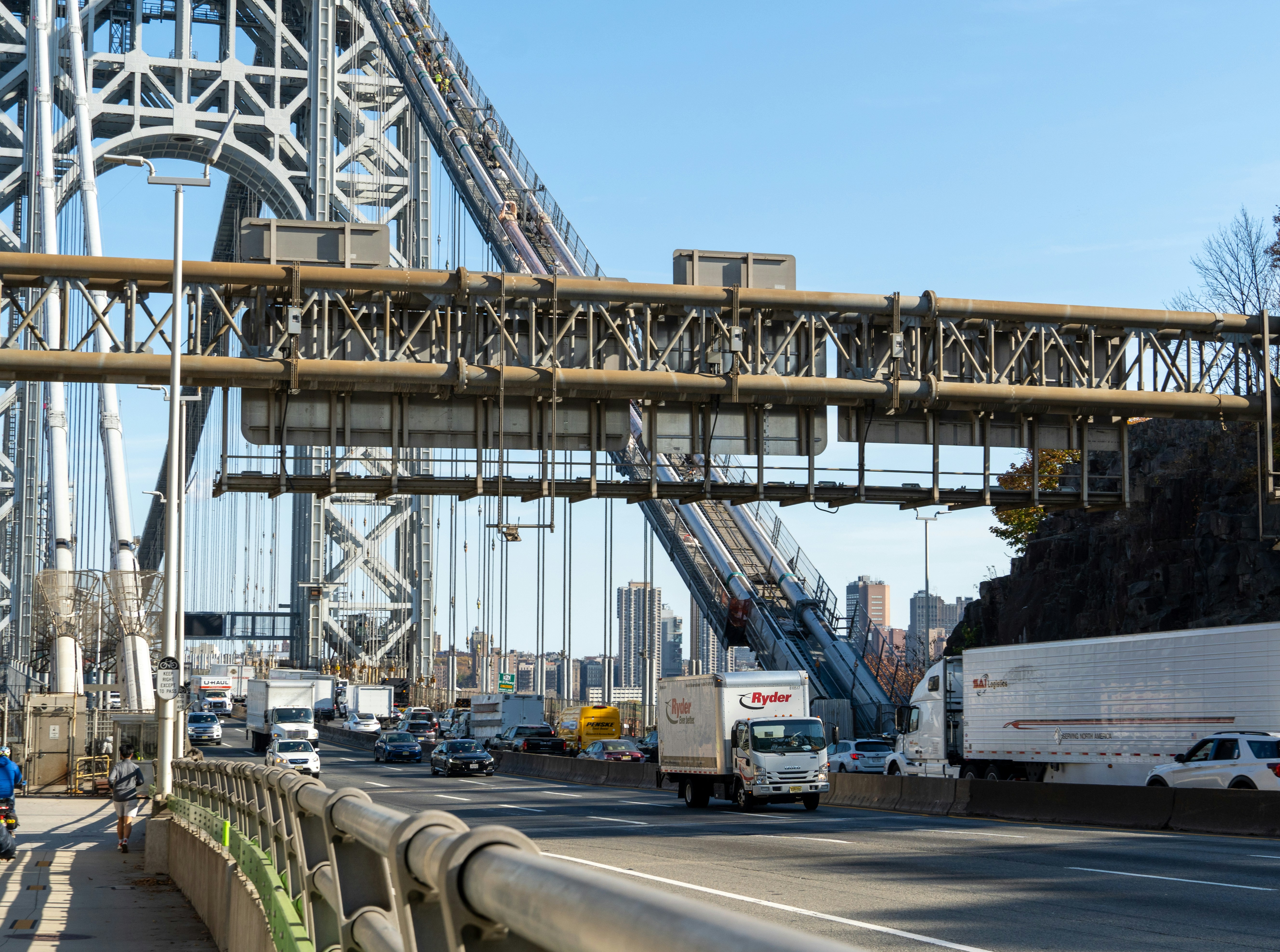 Bridge over busy highway with traffic