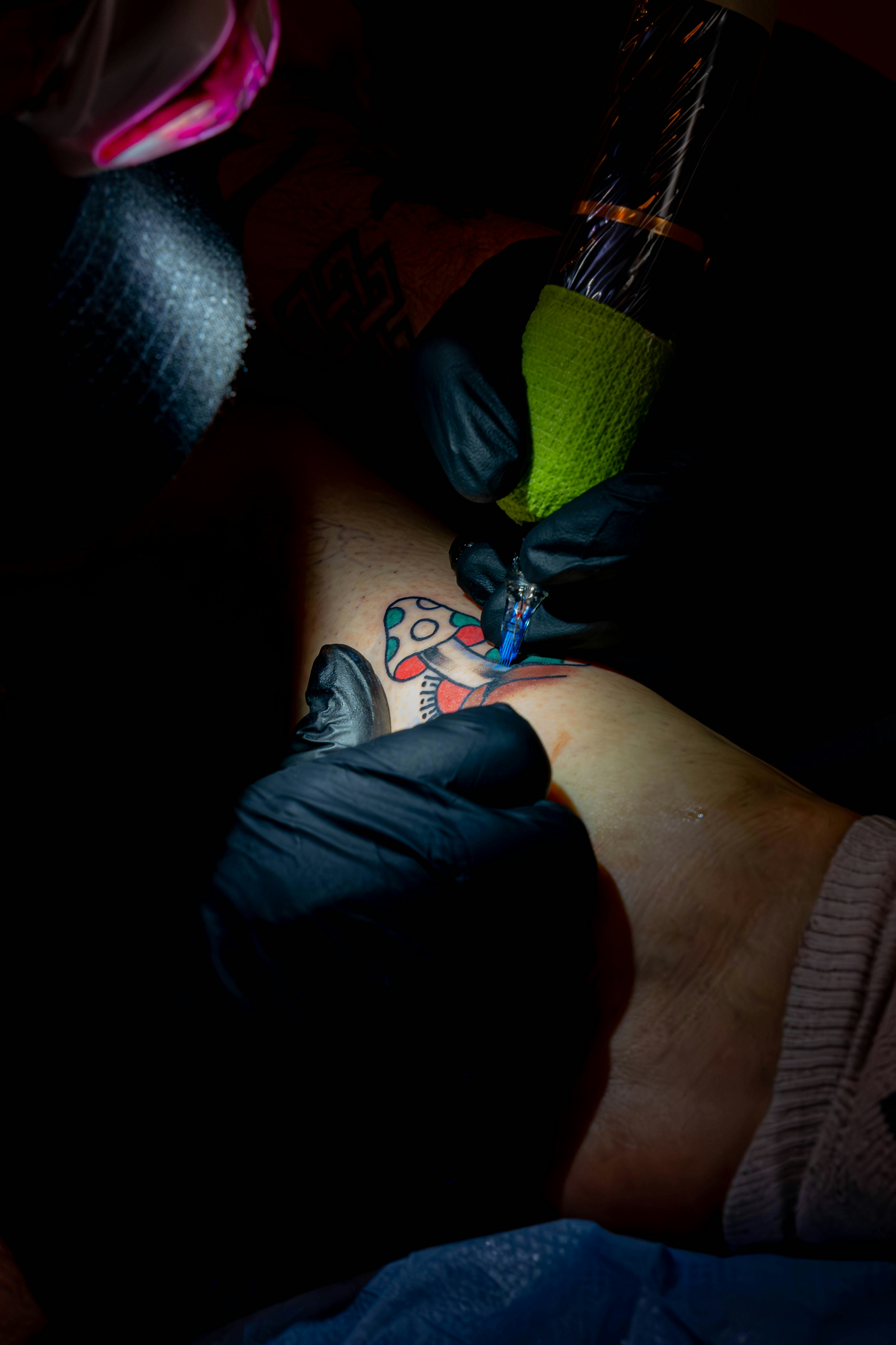 A person with a tattoo on their arm