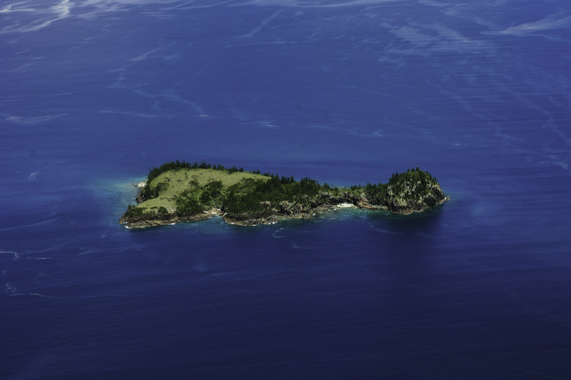 A small solitary island in the middle of the ocean for exclusive events