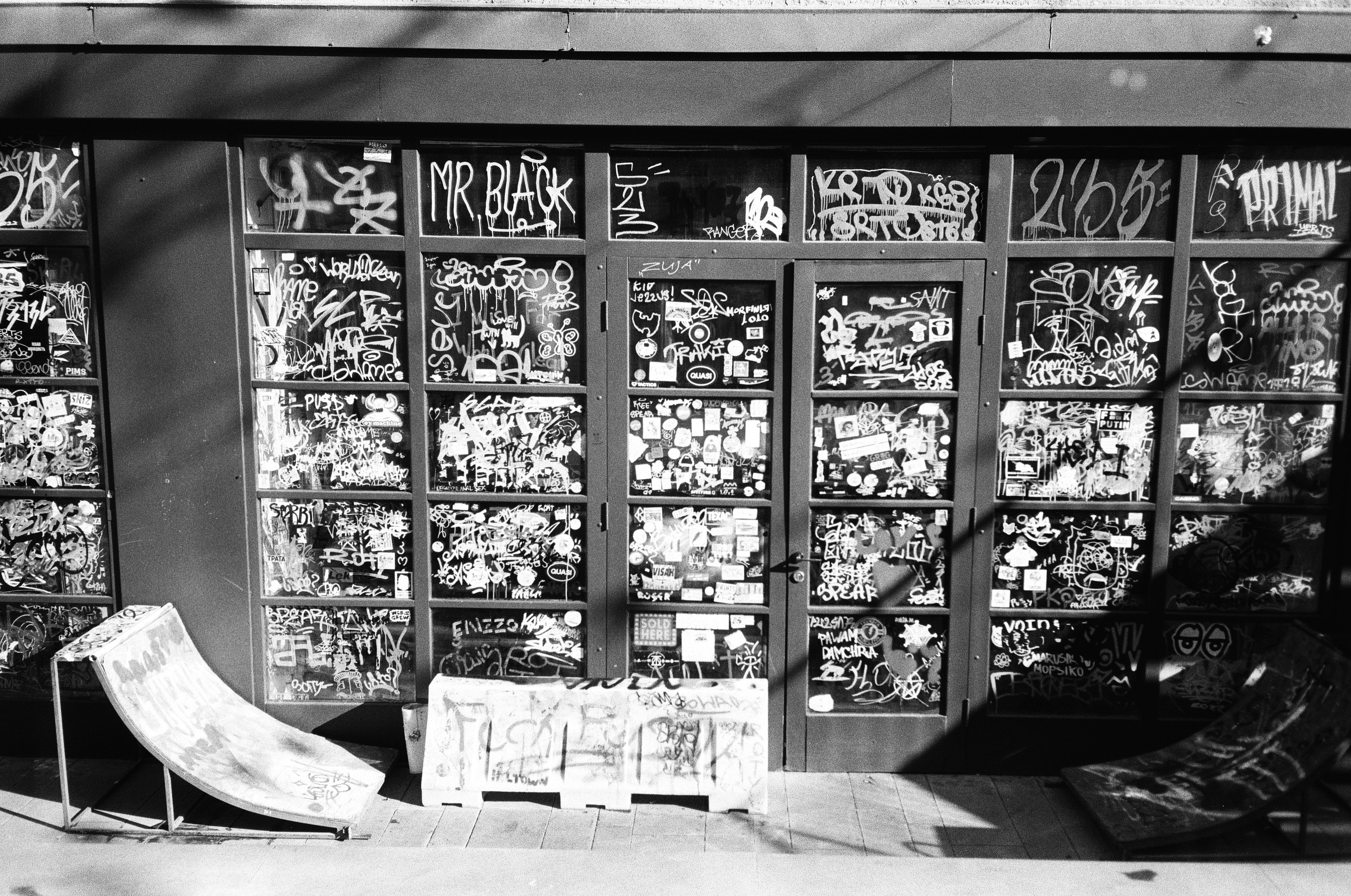 A black and white photo of a store front