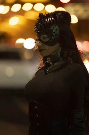 A woman dressed in a catwoman costume