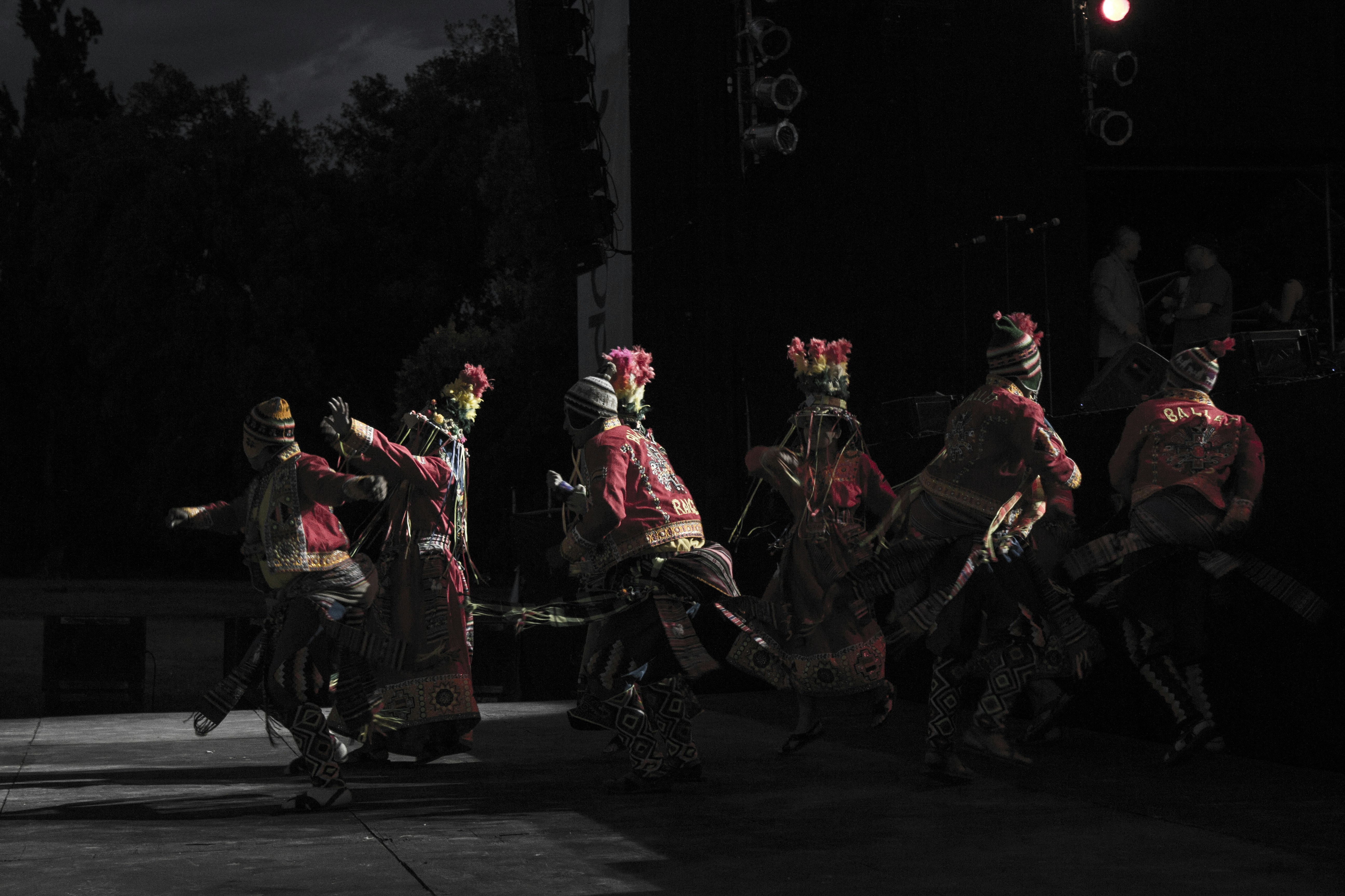 A group of people riding on the back of motorcycles