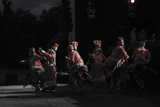 A group of people riding on the back of motorcycles