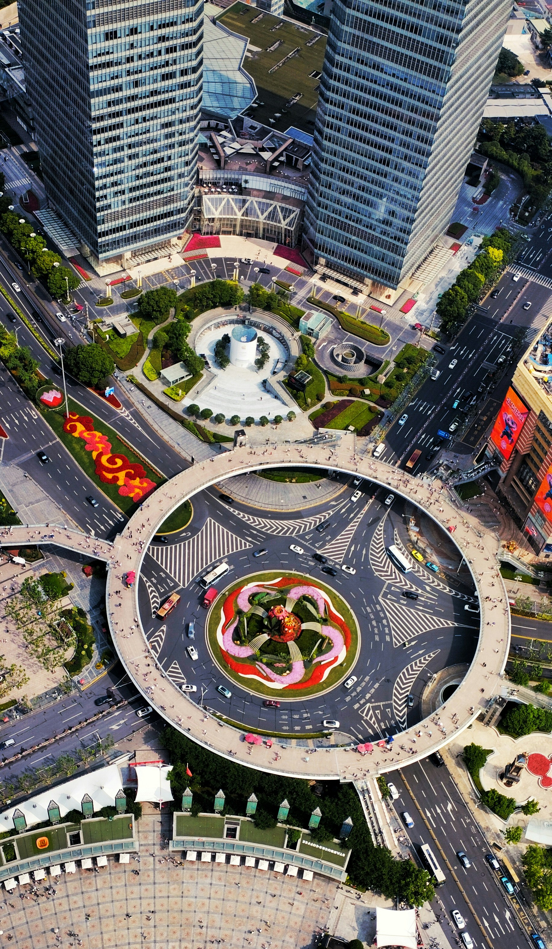 An aerial view of a city with lots of traffic