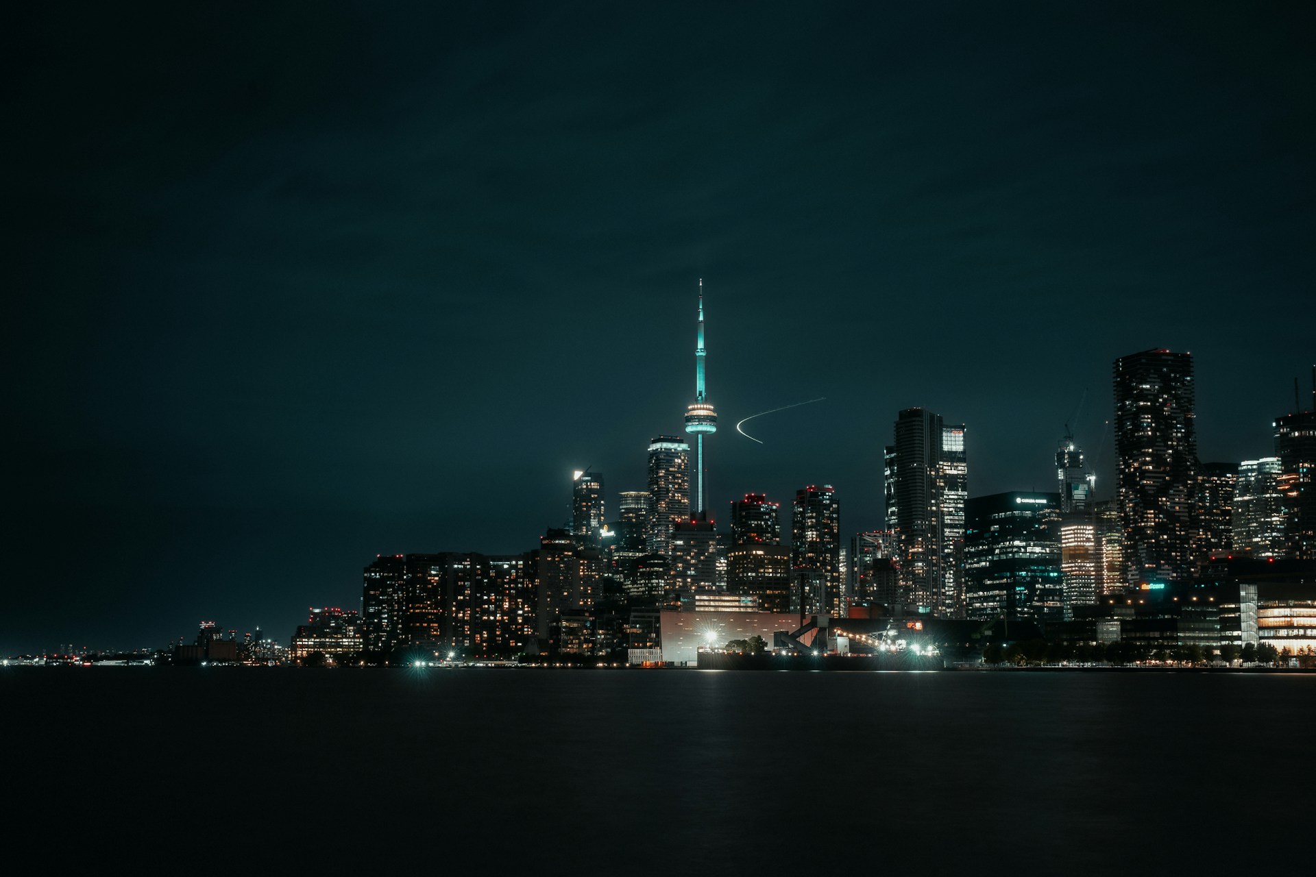 A view of a city at night from across the water
