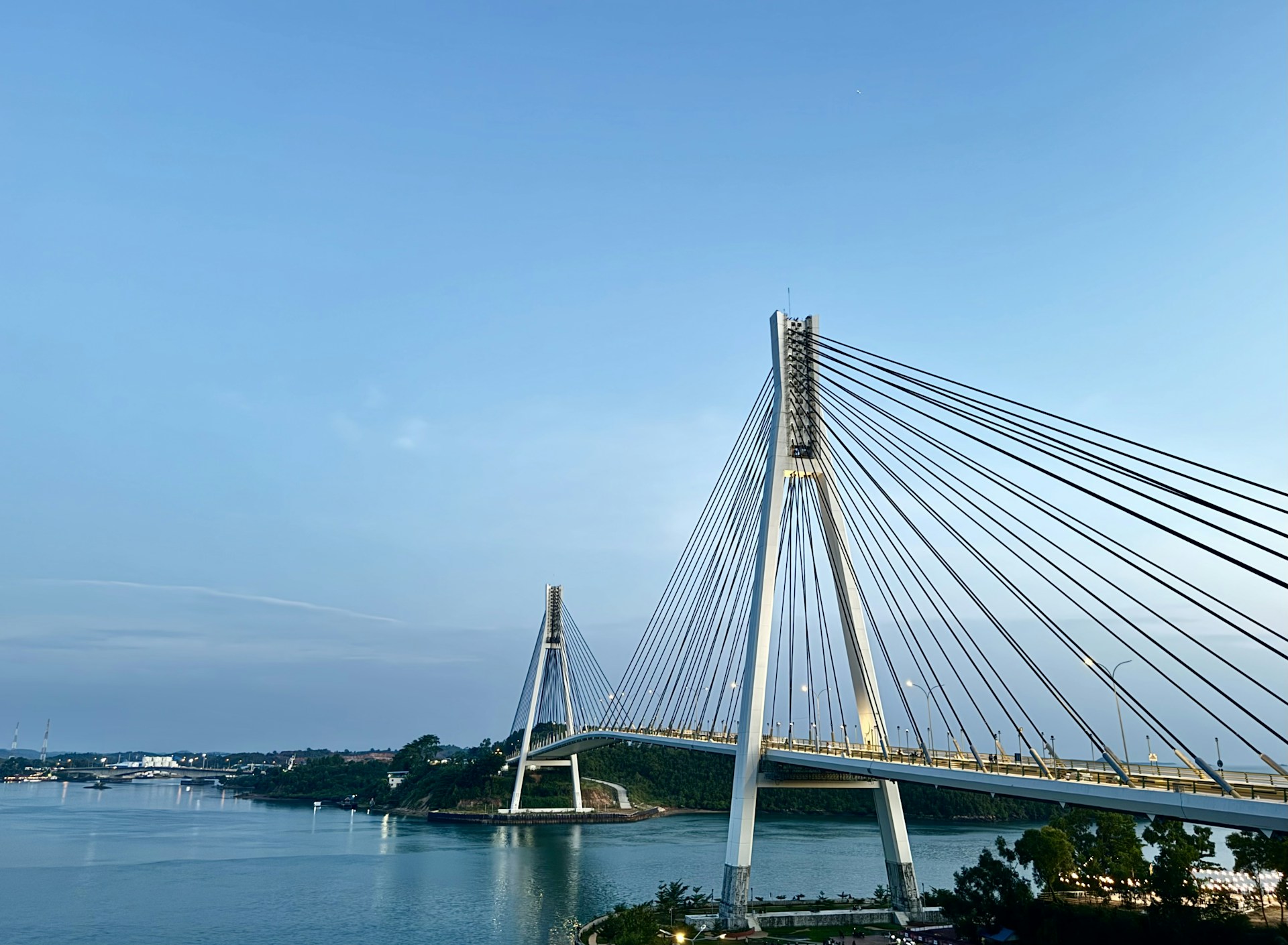 A large bridge spanning over a large body of water