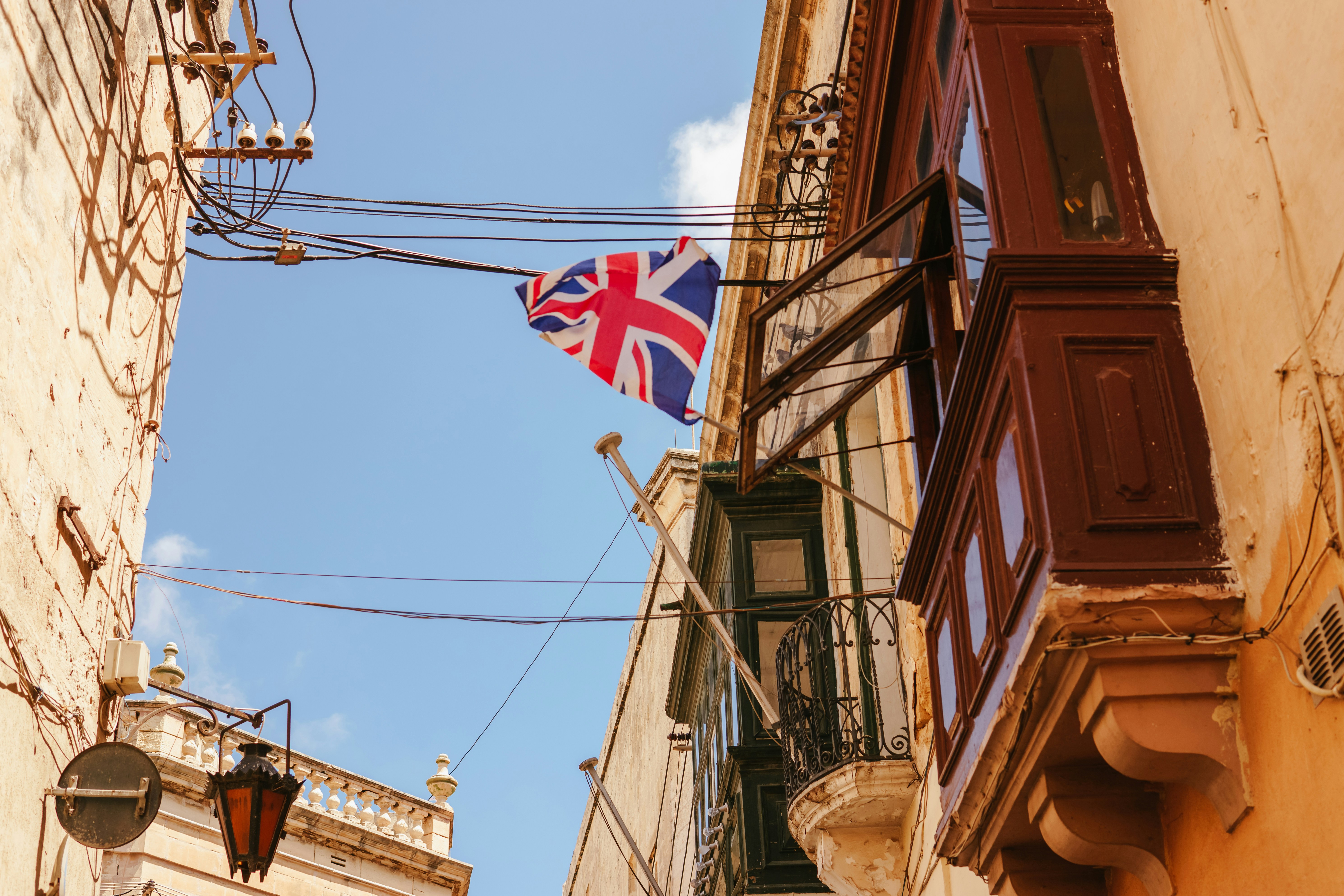 A british flag hanging from the side of a building