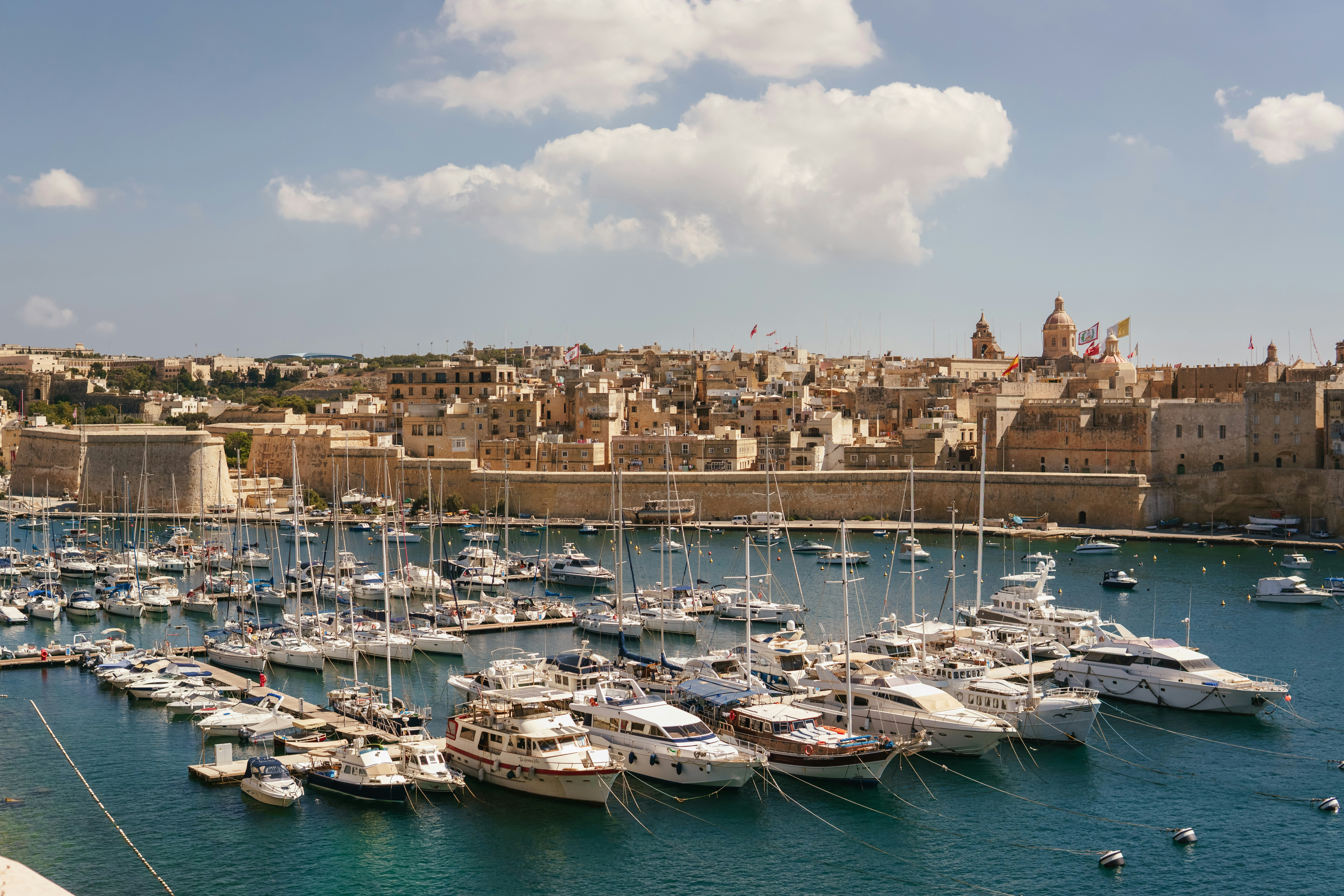 A harbor filled with lots of white boats