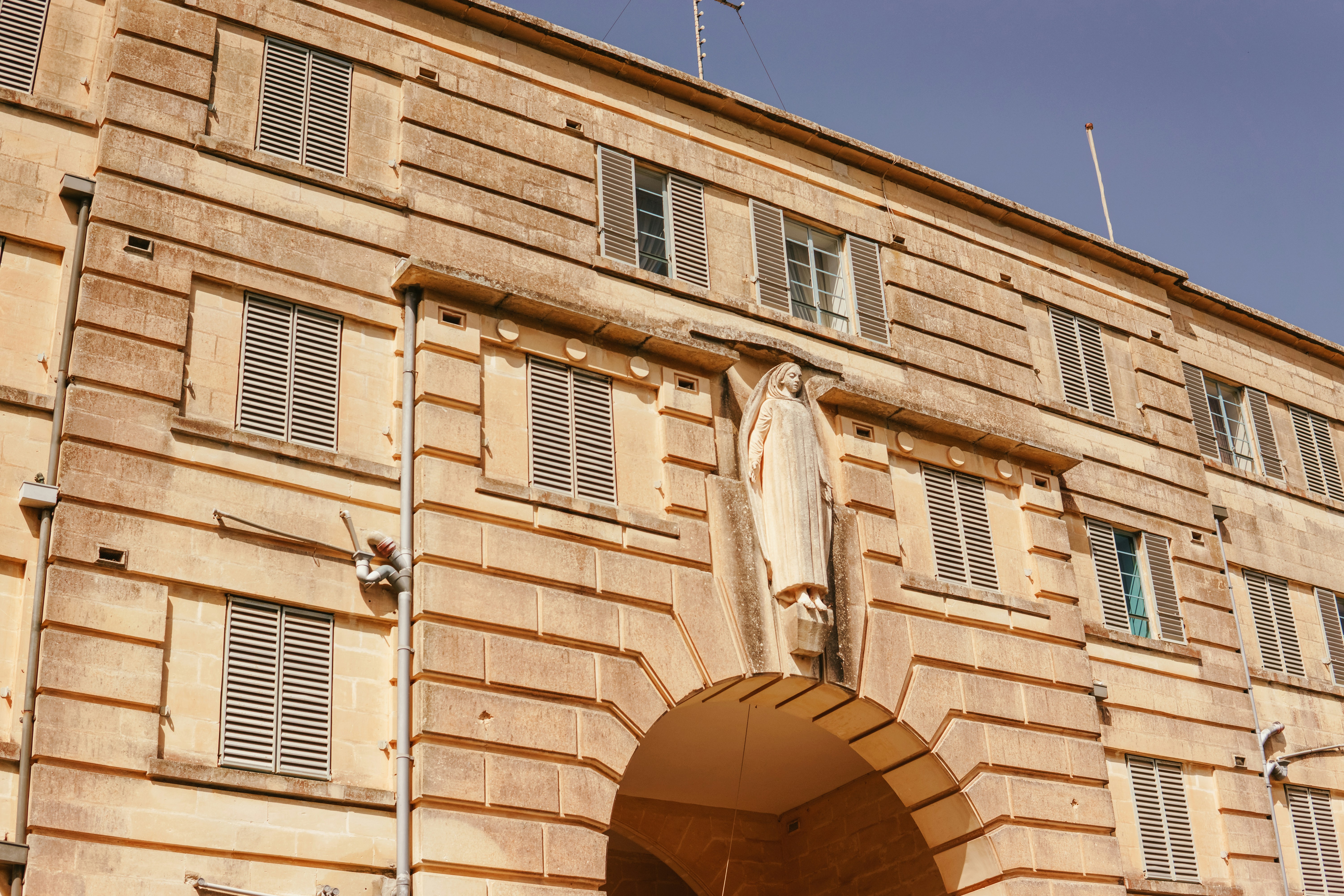 A large building with a clock on the front of it