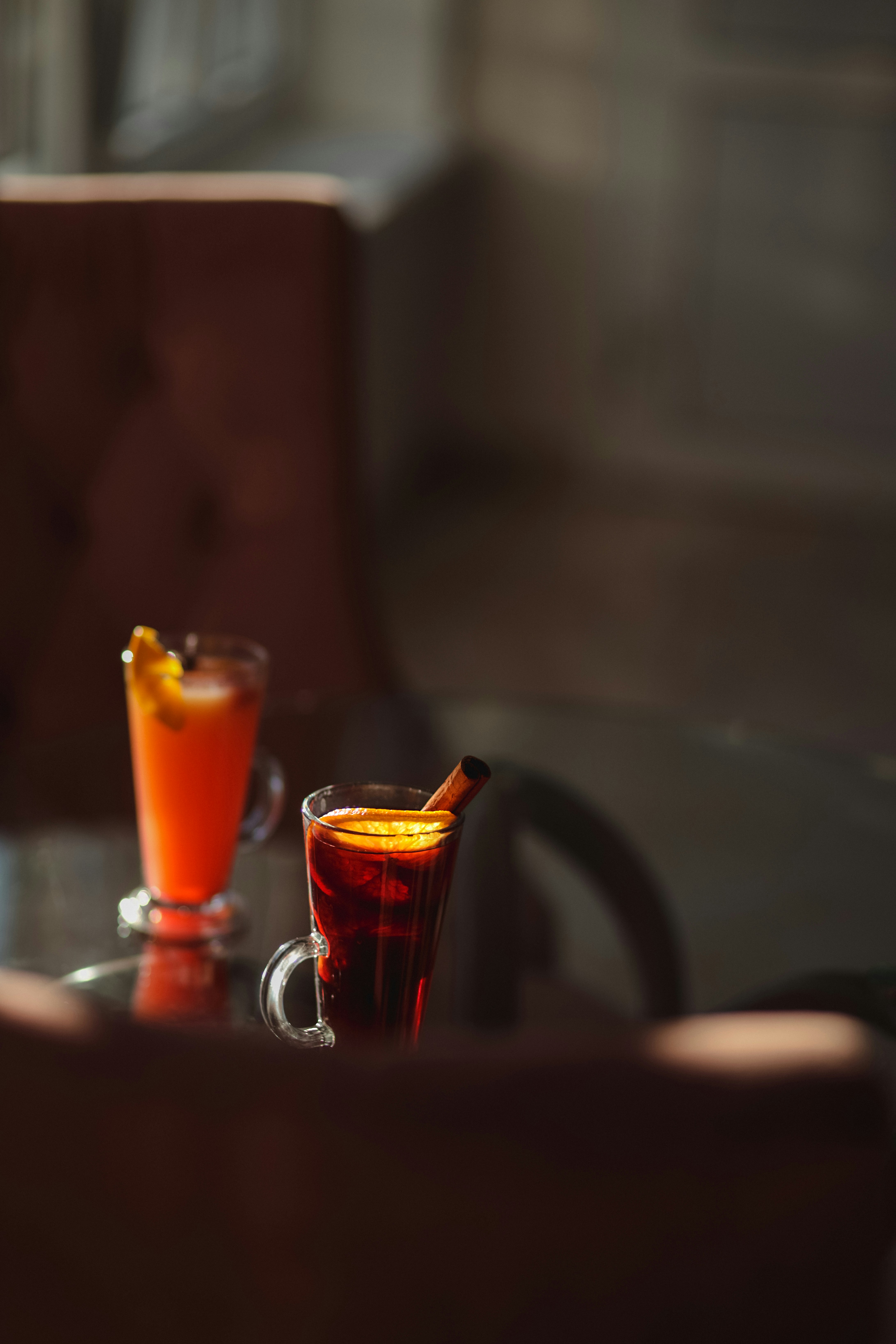 A couple of drinks sitting on top of a table