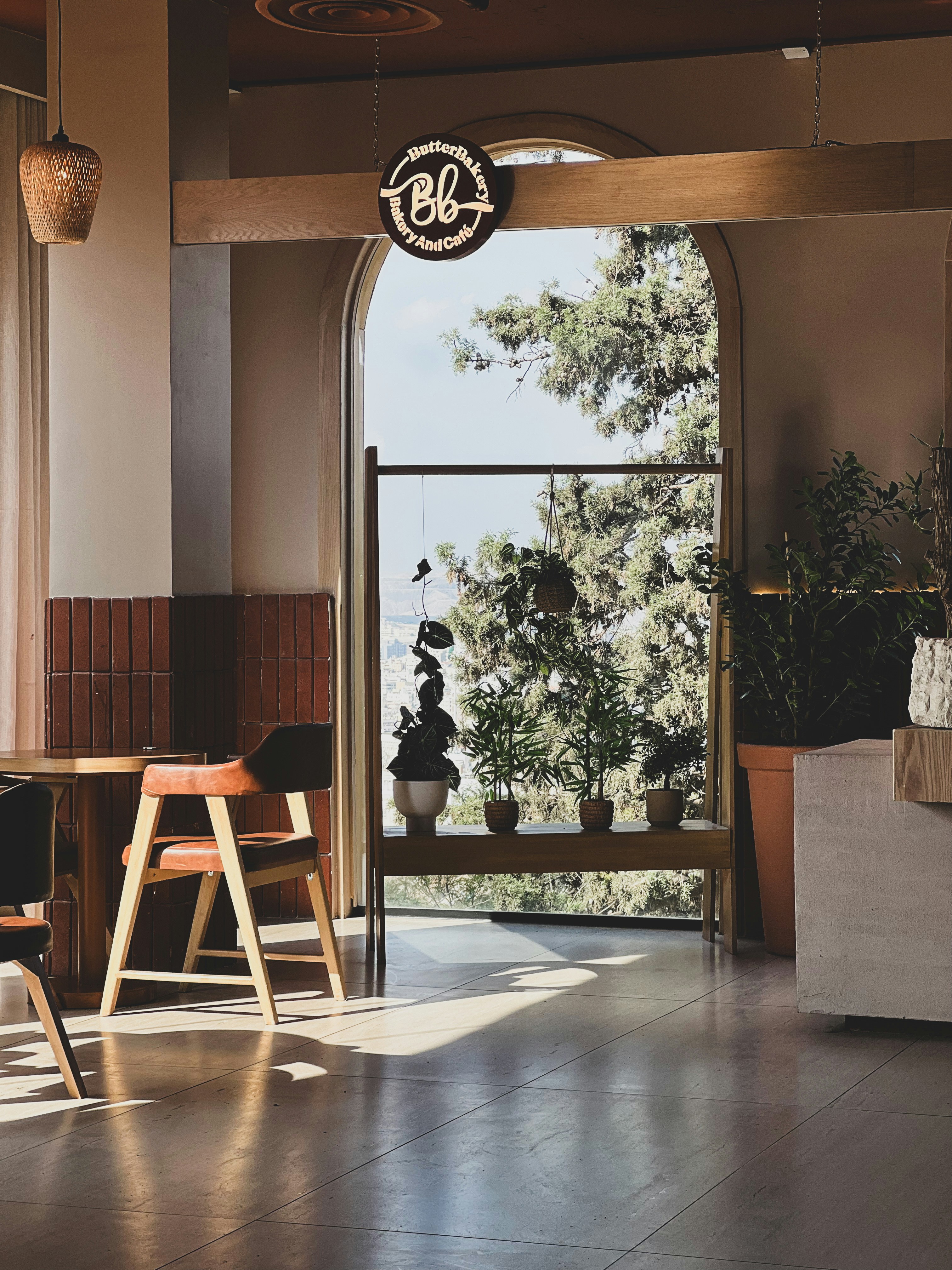 A living room filled with furniture and a large window
