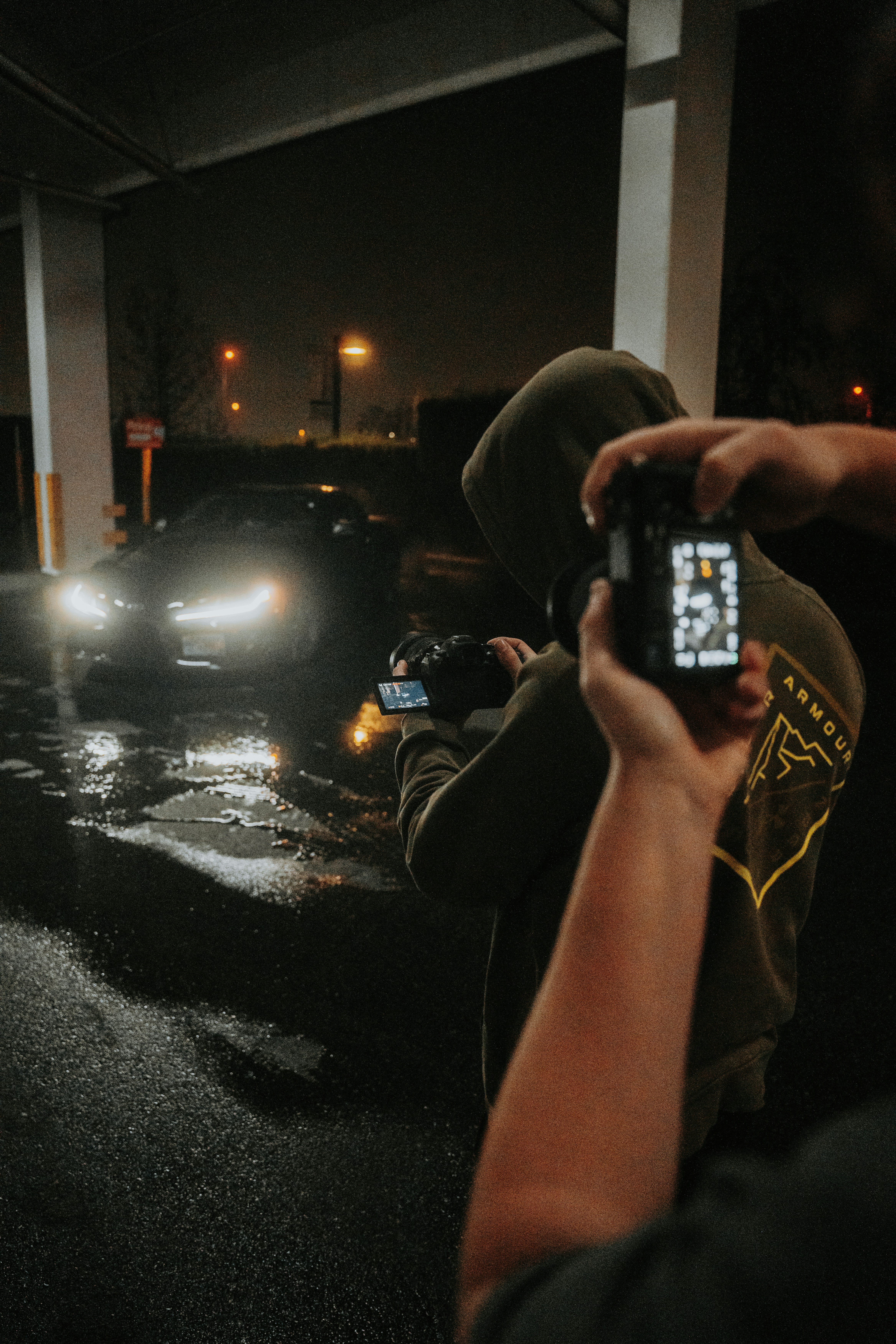 Person taking photos of a car accident scene