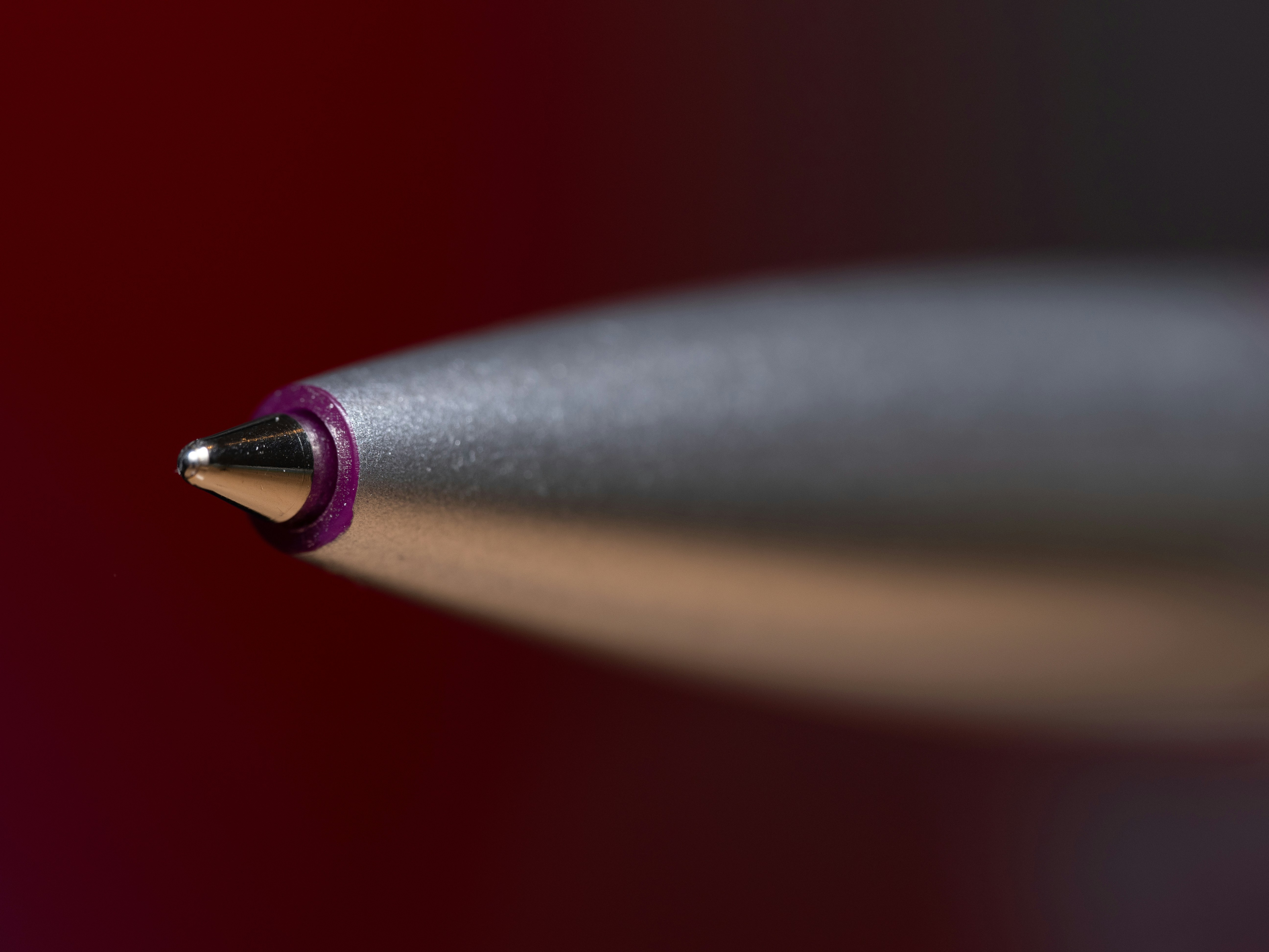 A close up of a pencil with a blurry background
