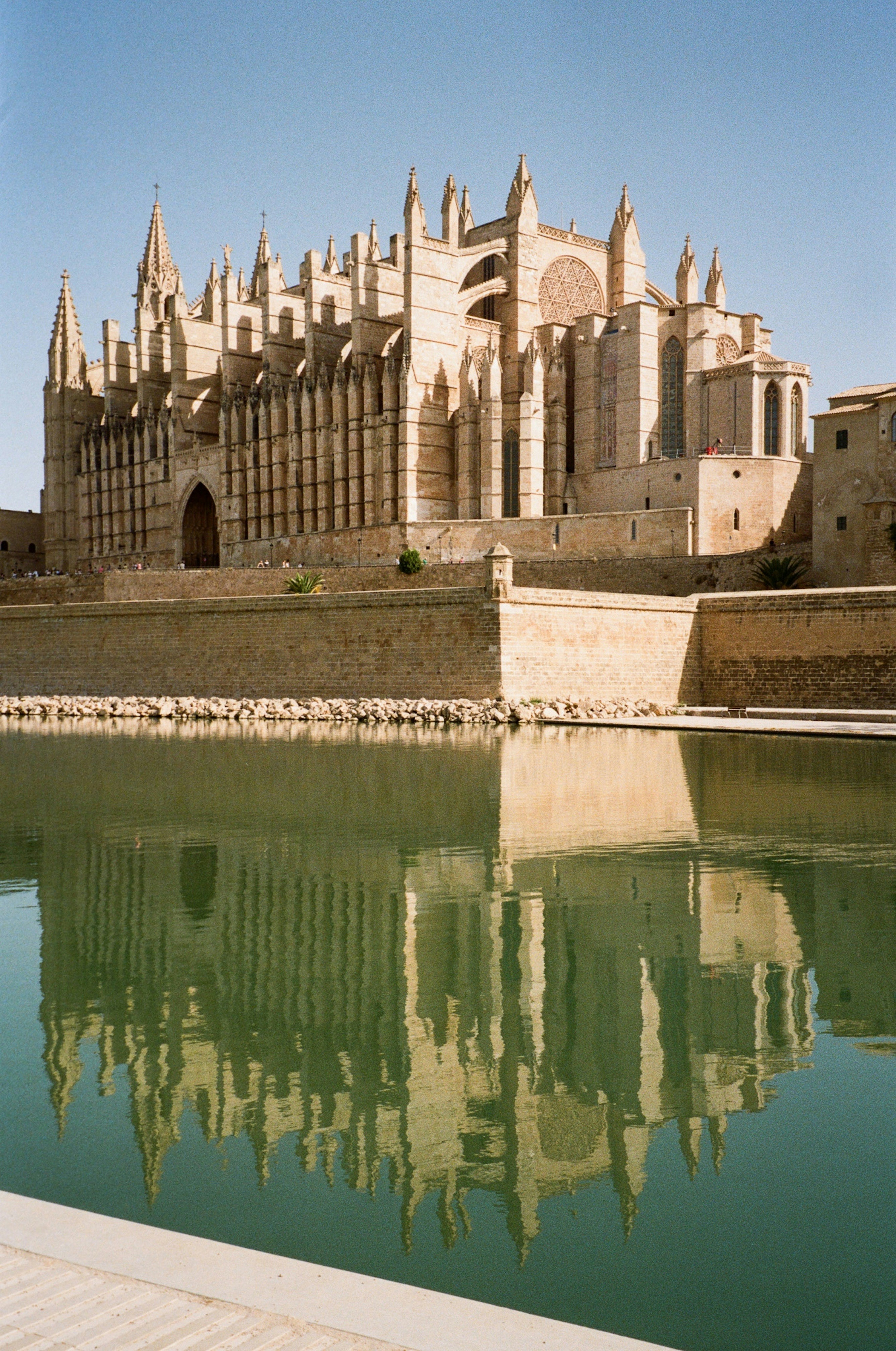 A large building sitting next to a body of water