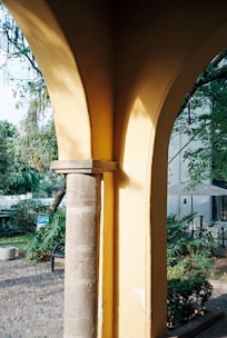A view of a building through an archway