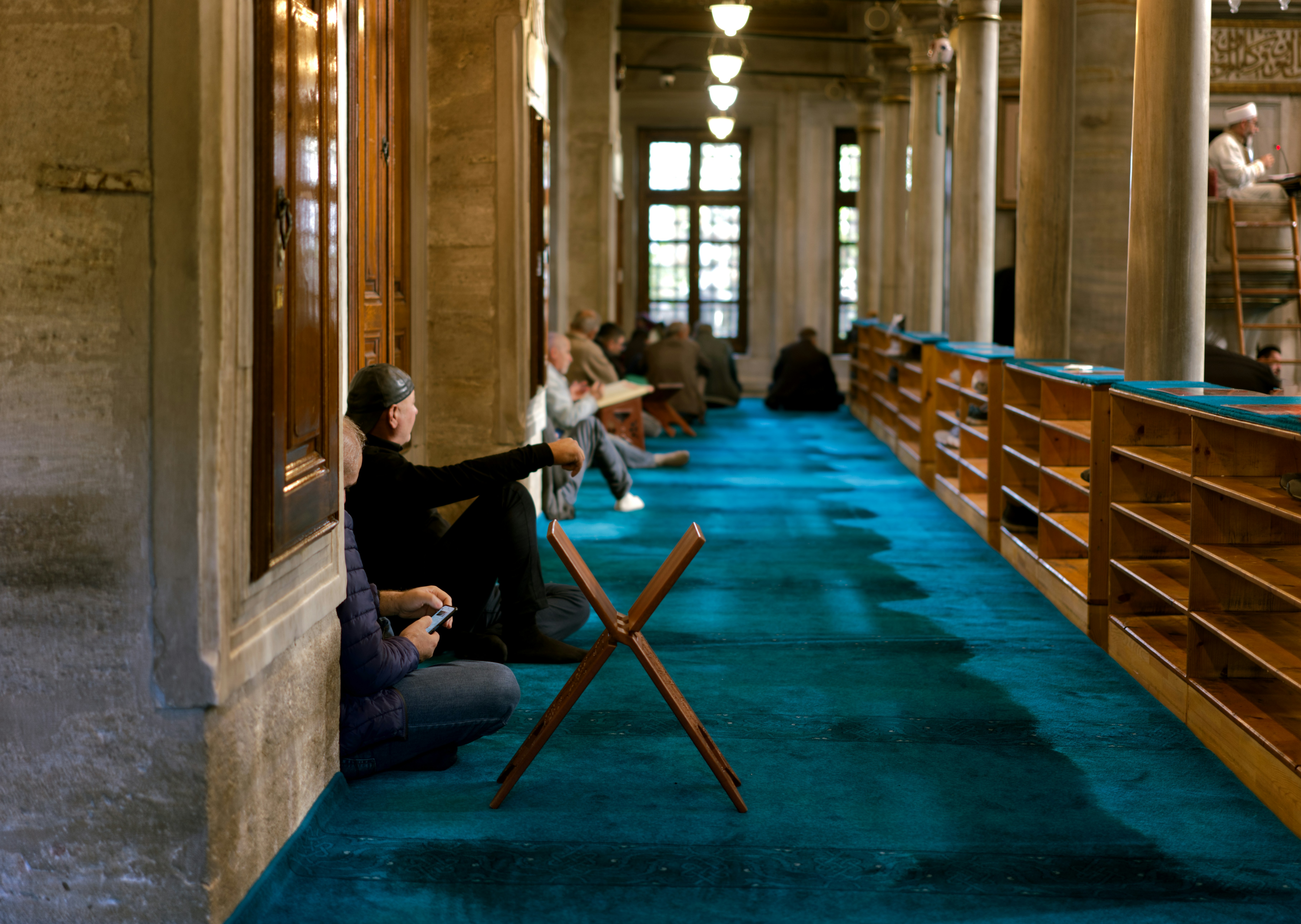 Person sitting in prayer room