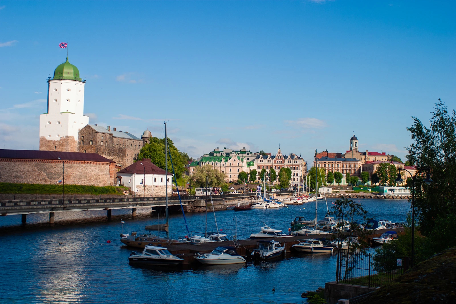 The castle’s St Olaf tower above the harbour — Vyborg, Russia