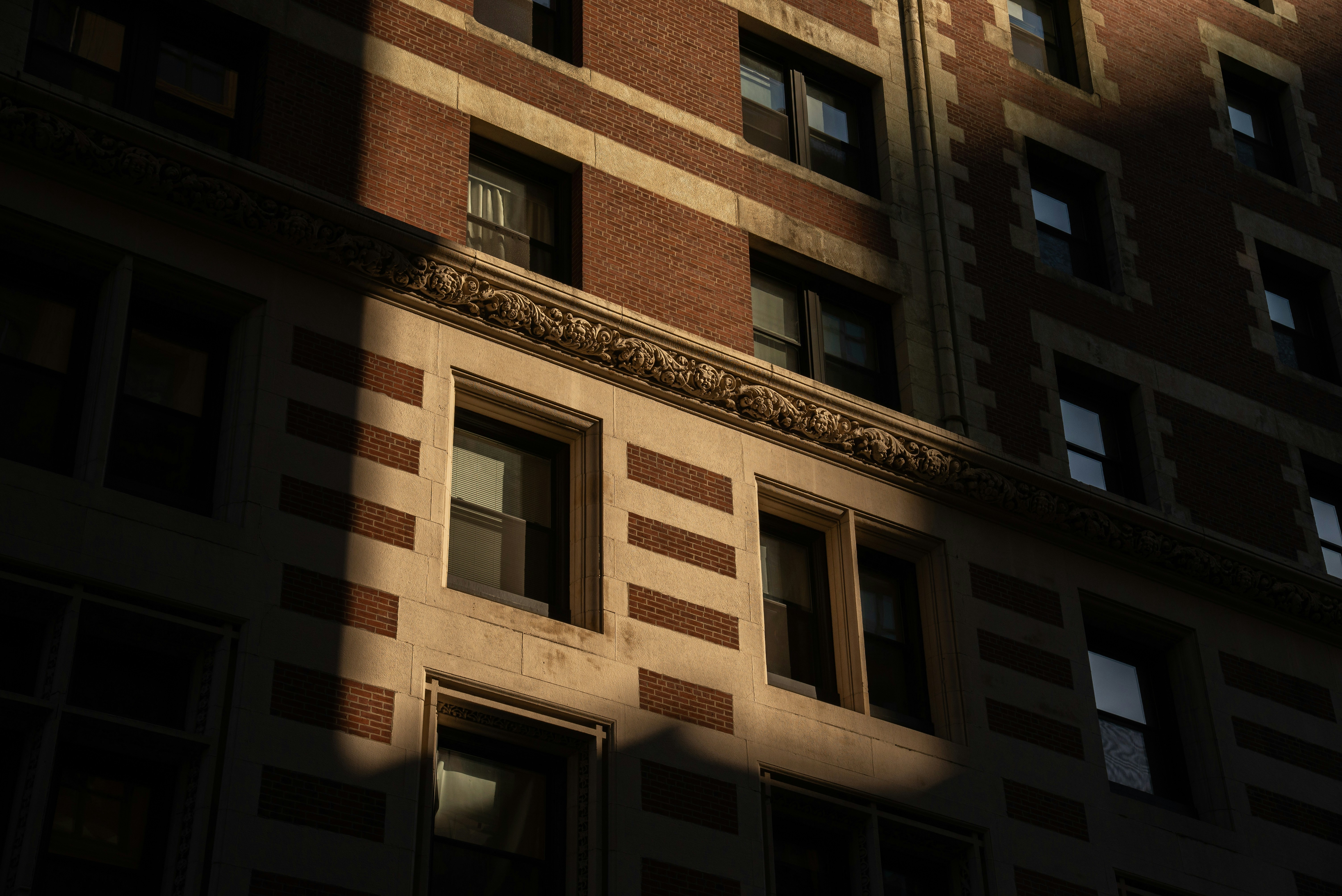 A tall building with a clock on the side of it