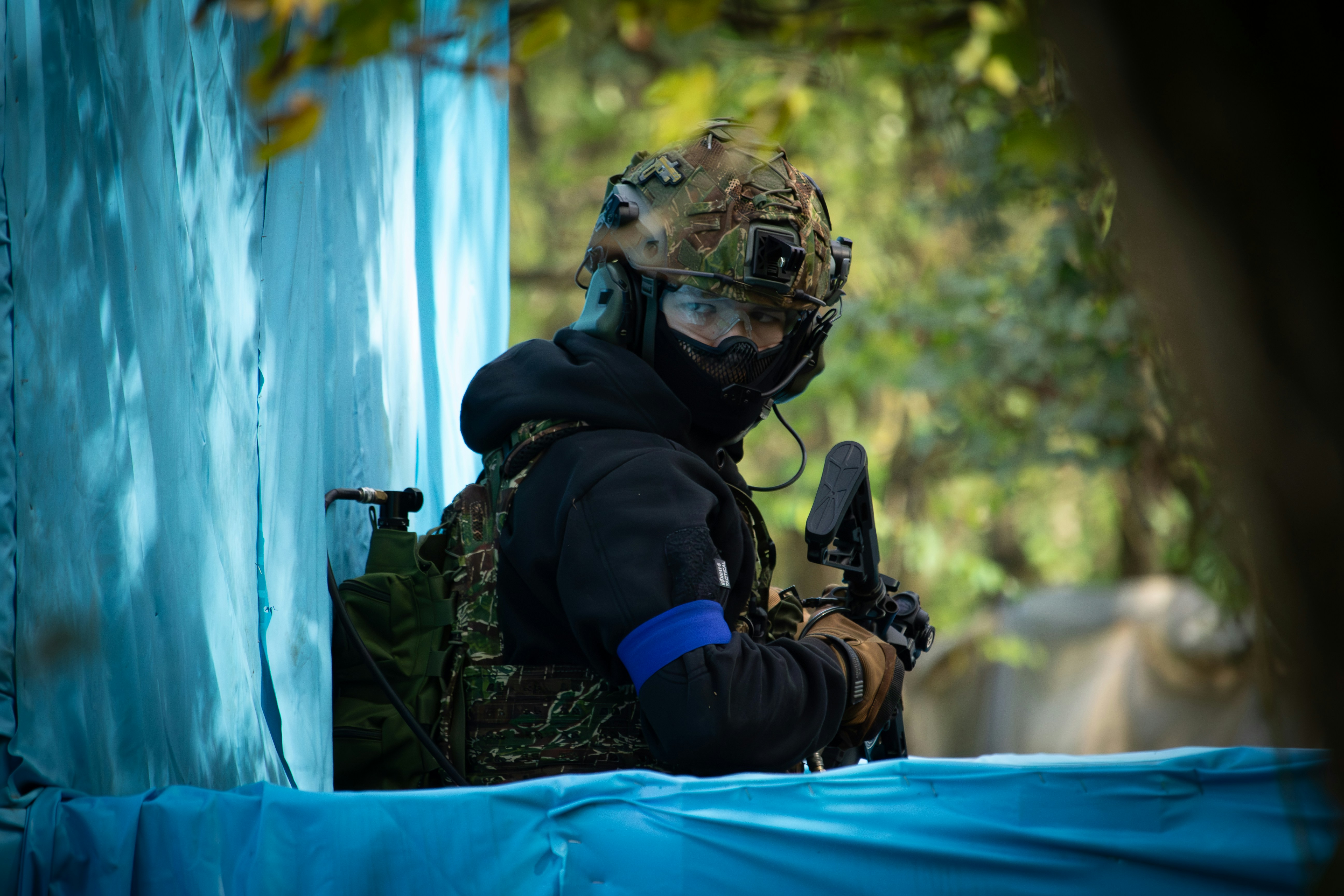 A man with a paintball in his hand