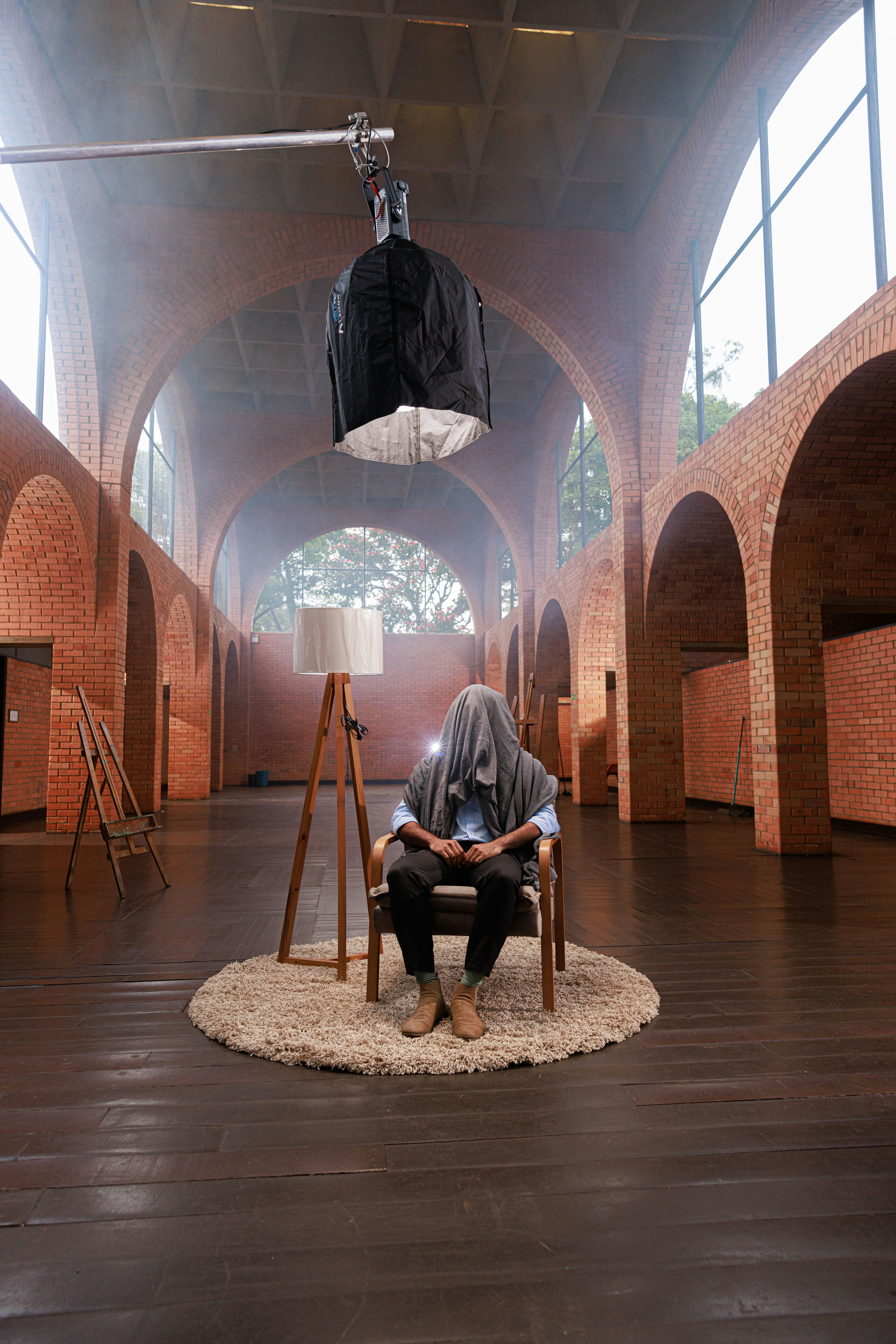 A person sitting on a chair in a room
