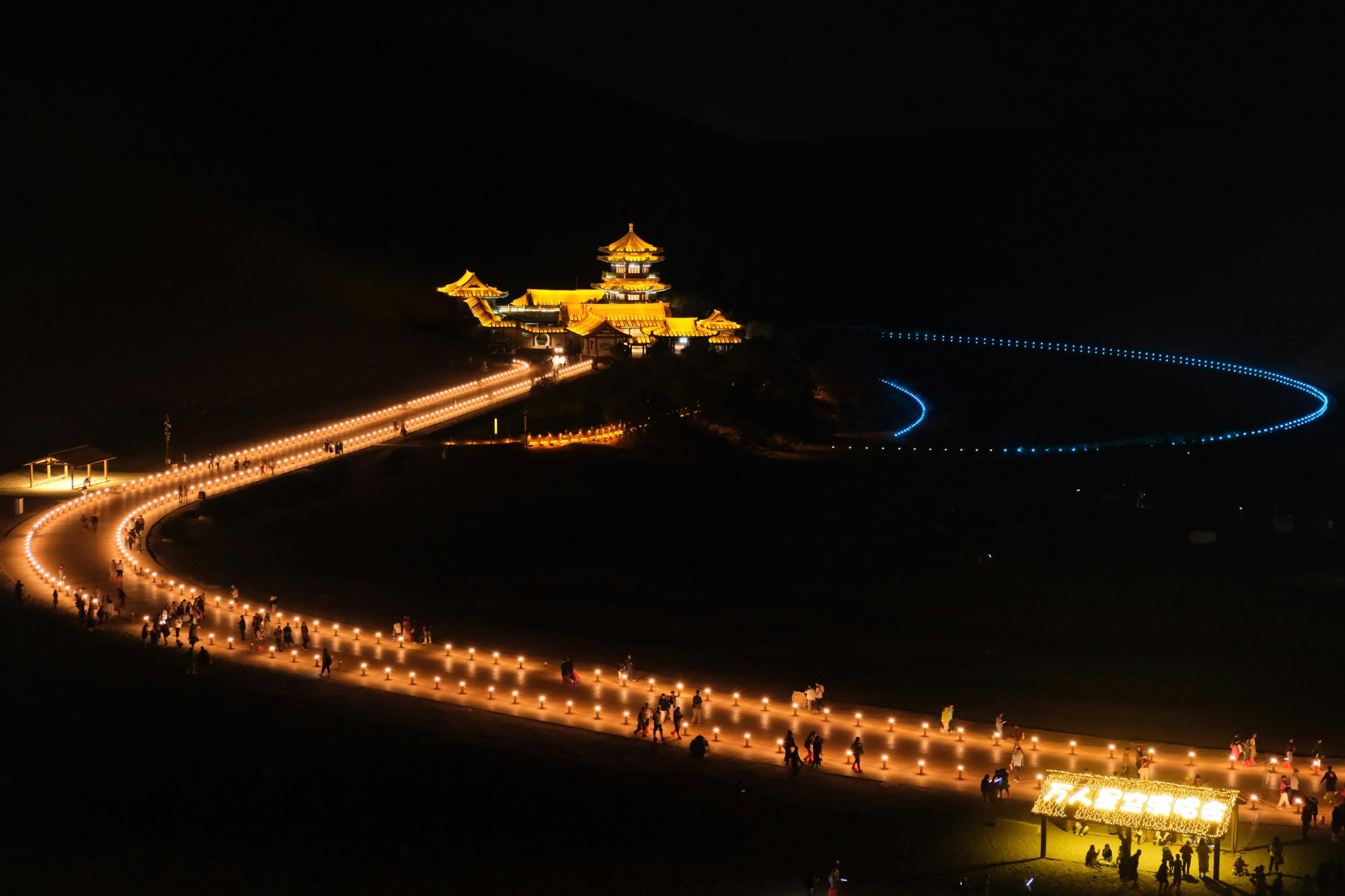 An aerial view of a city at night