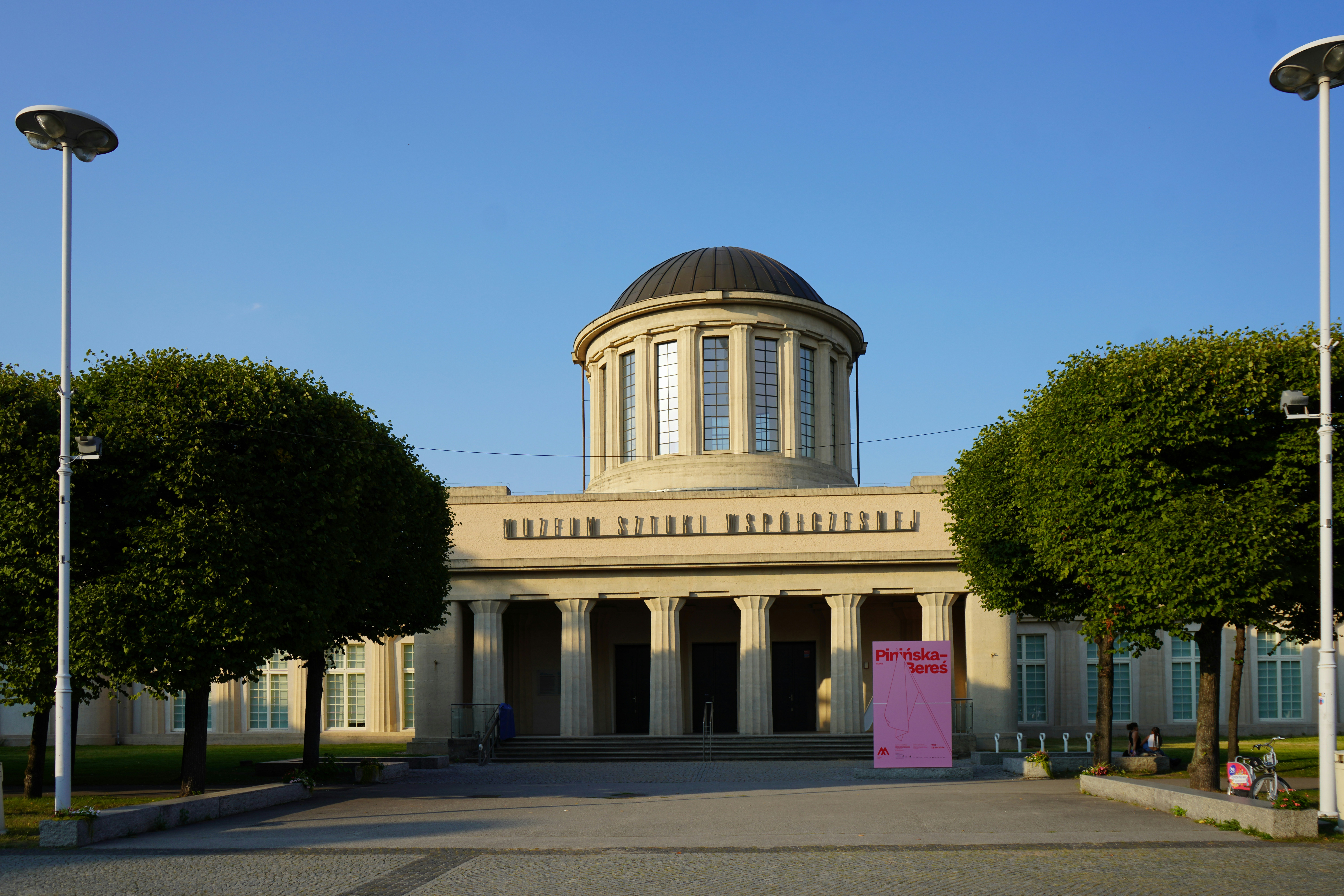 A large building with a dome on top of it