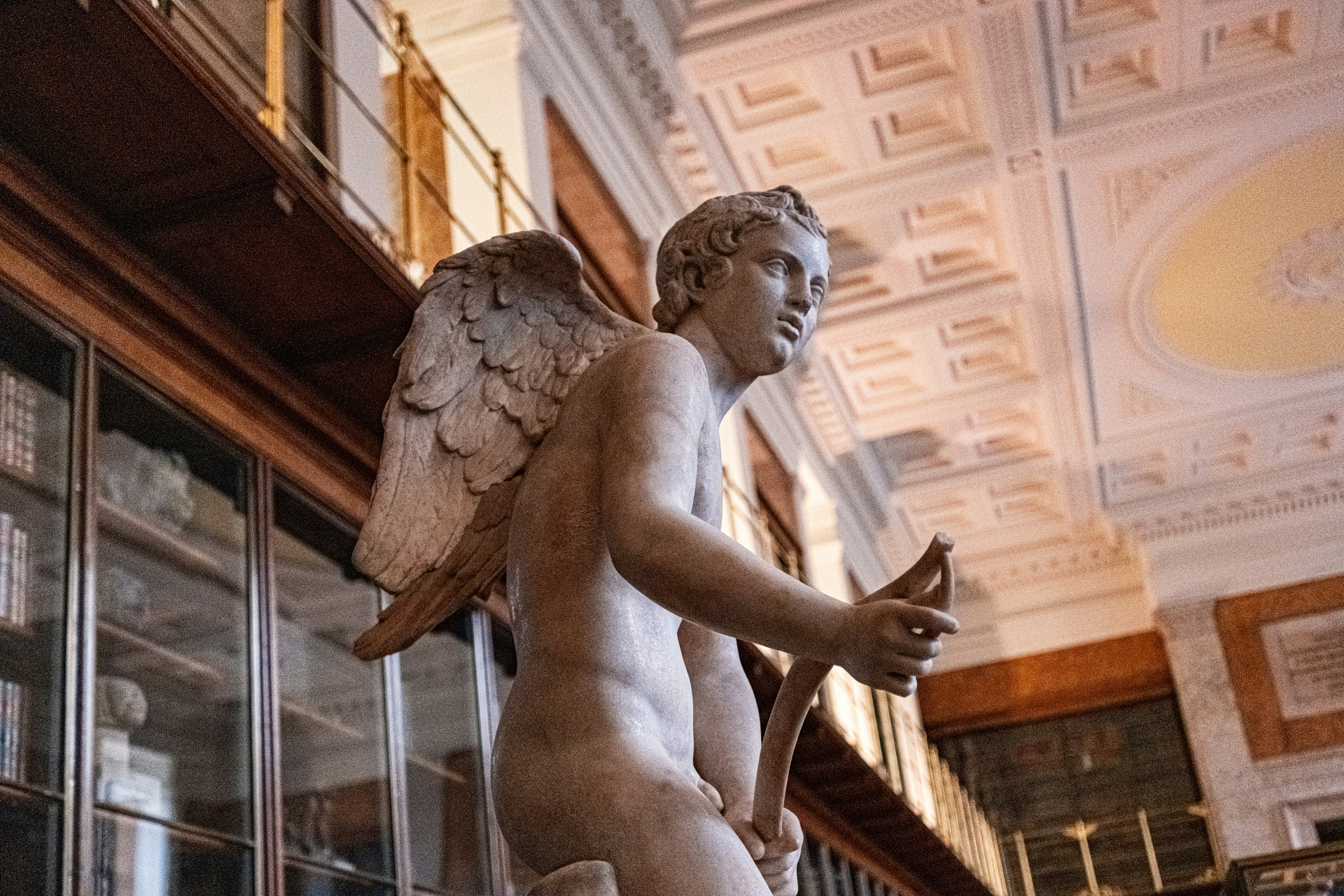 A statue of an angel in a museum