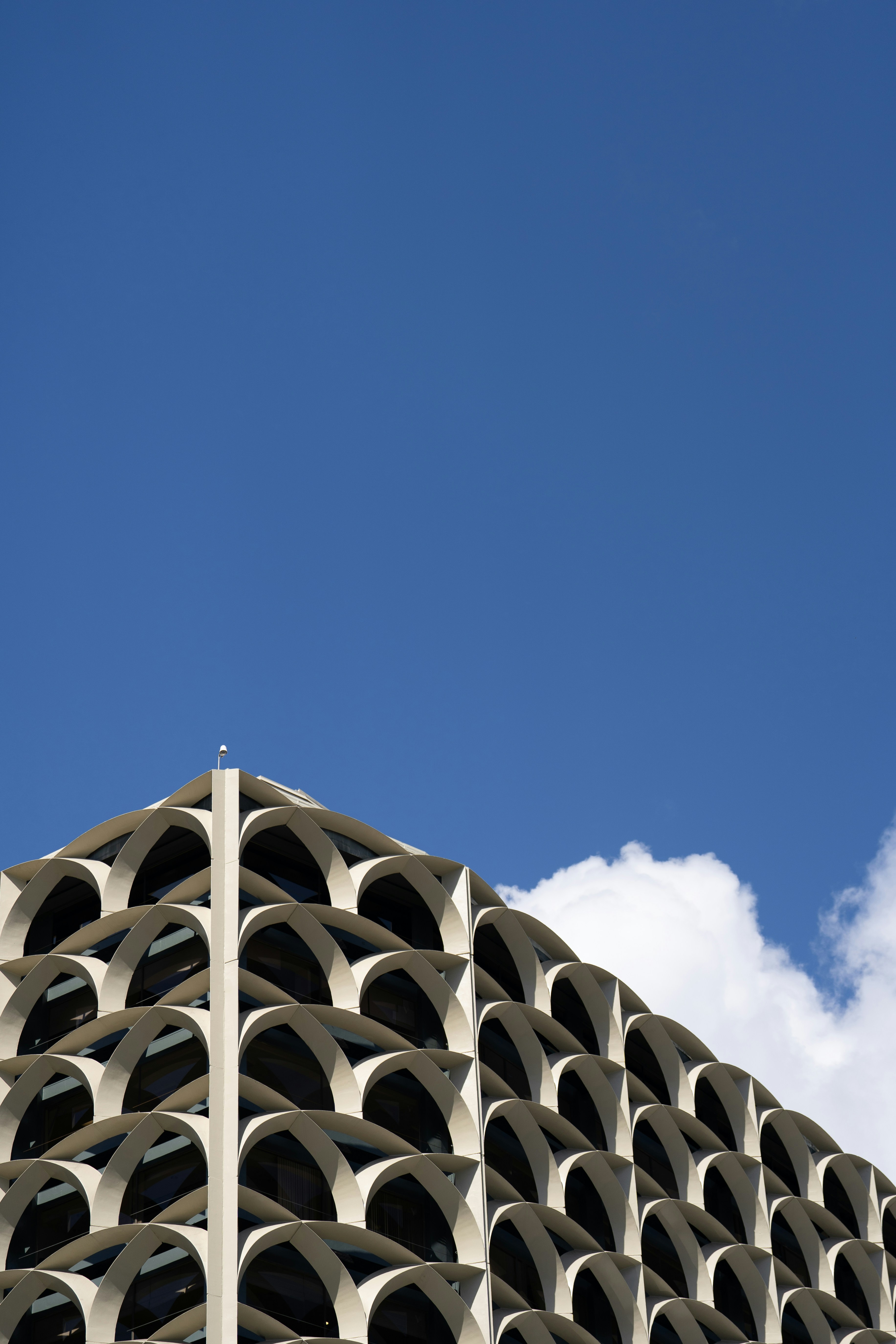 A tall building with a clock on the top of it