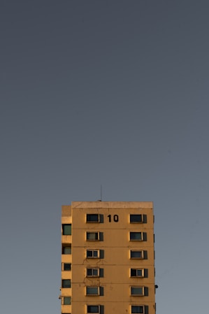 A tall building with a clock on the top of it