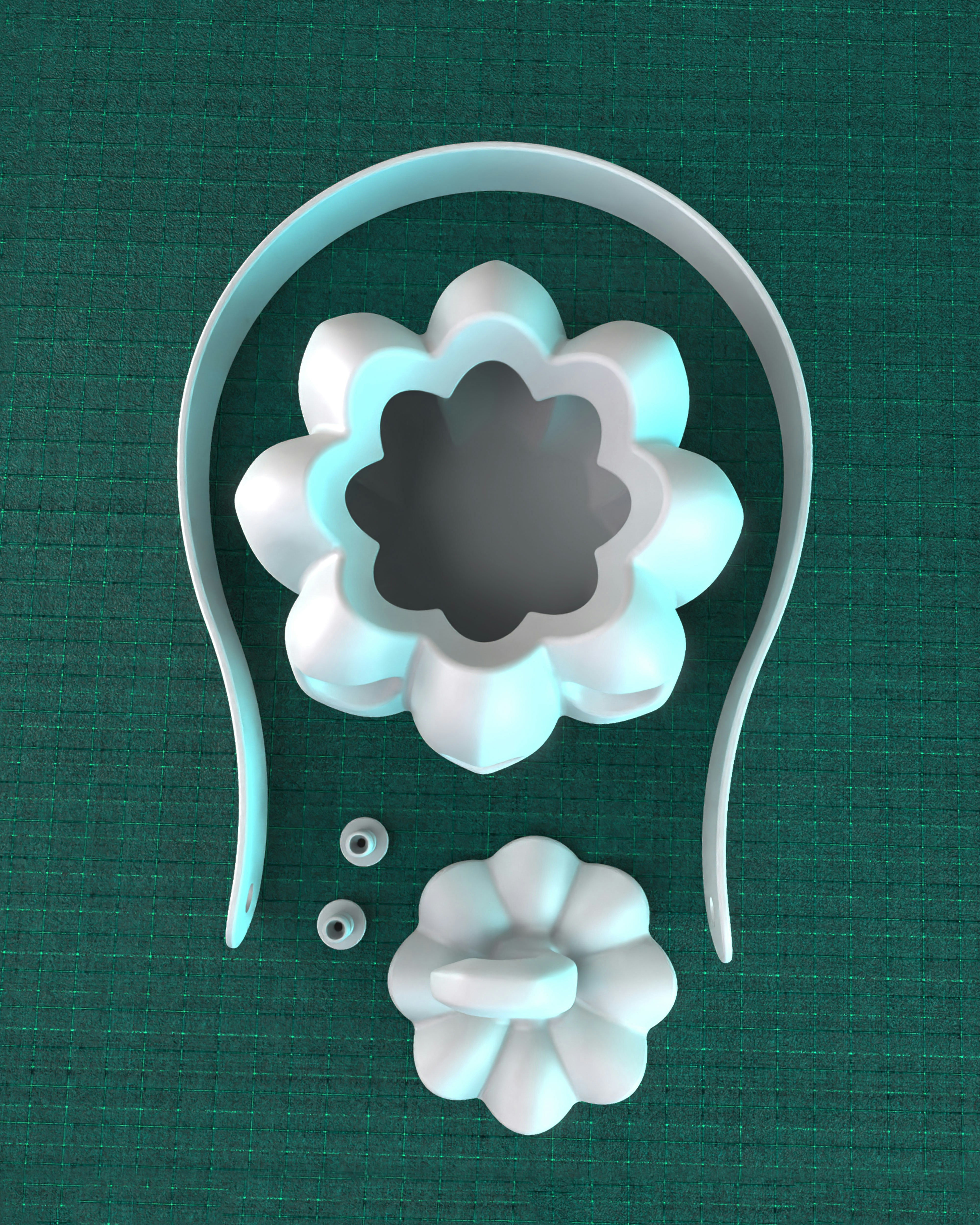 A paper cutout of a flower on a green background