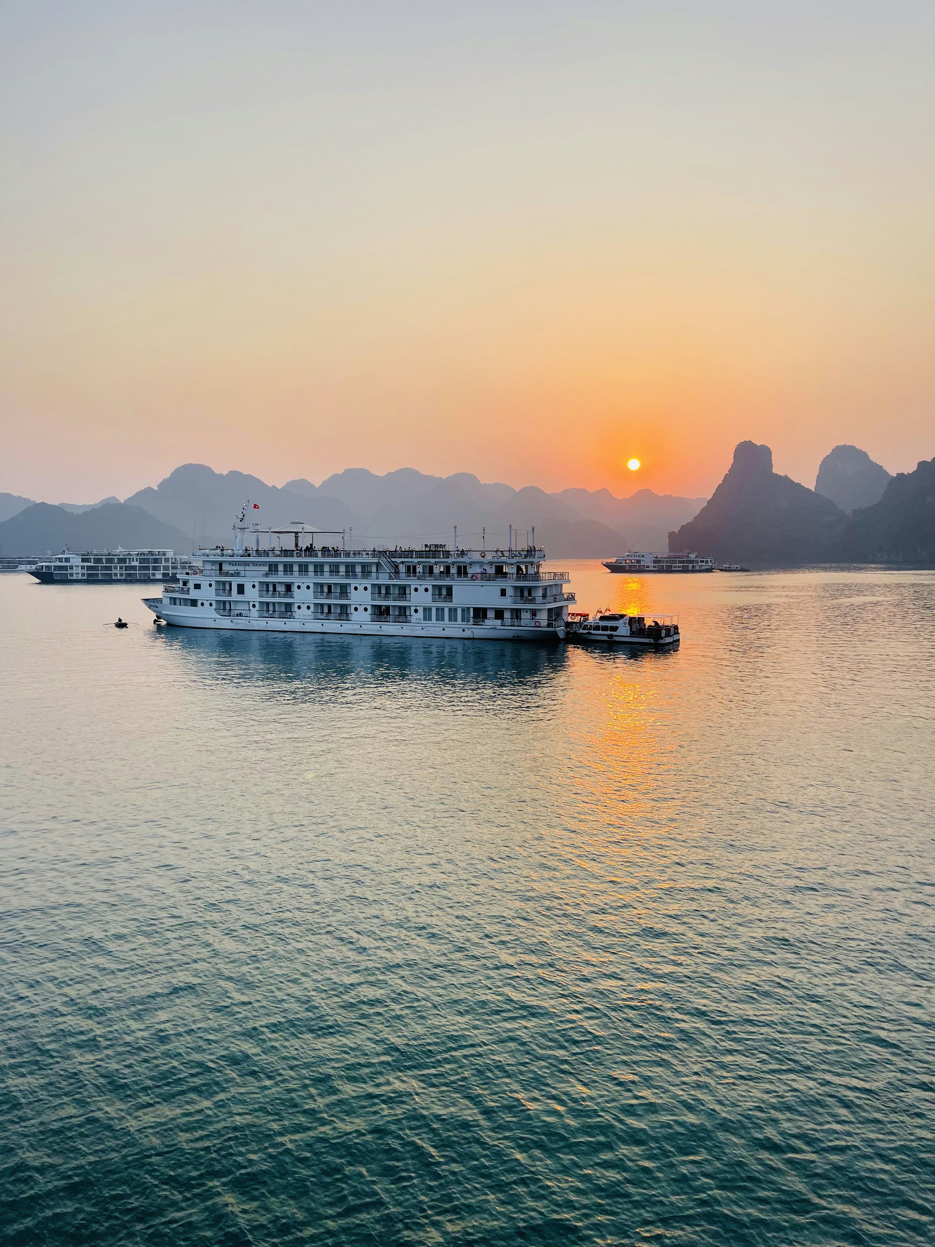 A large boat floating on top of a large body of water