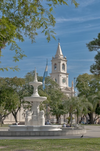 A large white building with a clock tower