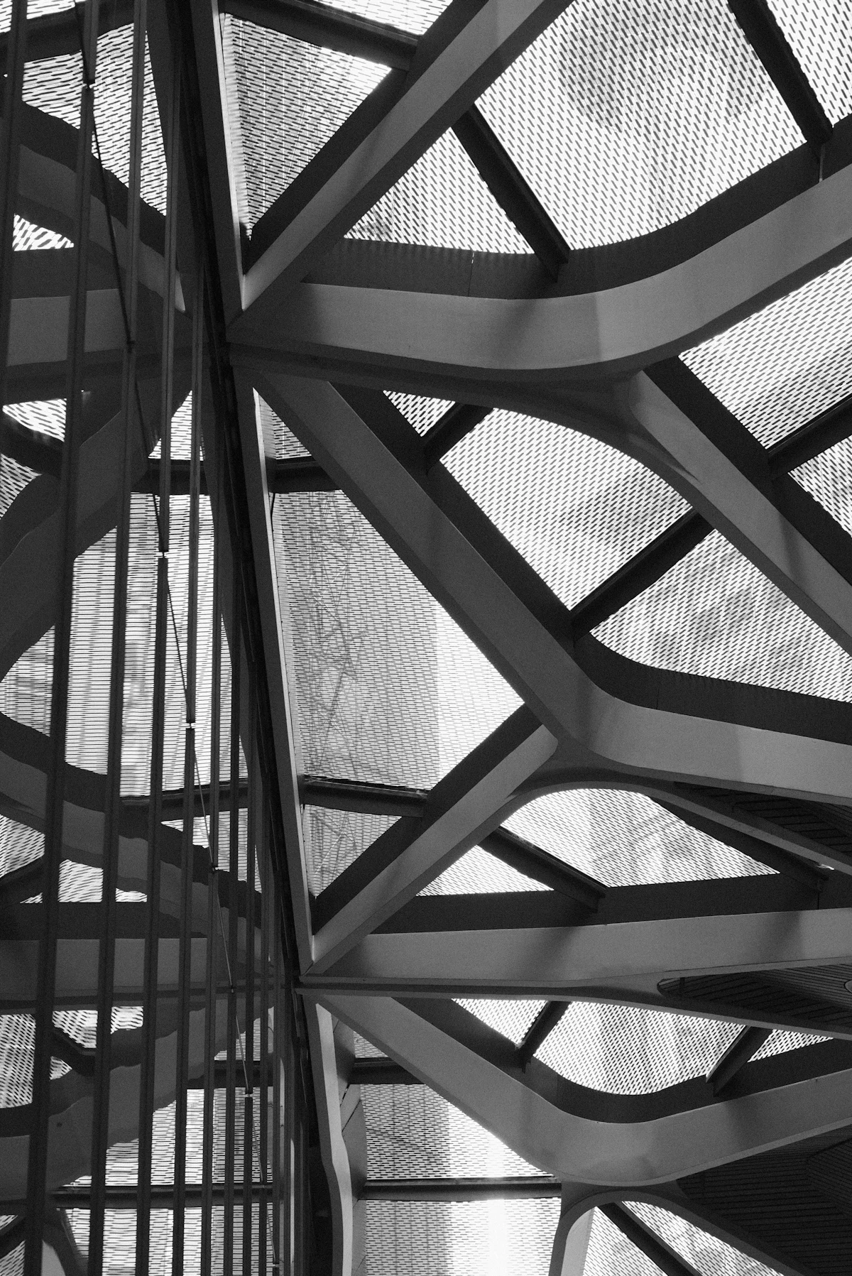 Black and white close up of a steel structure against the sky in Sydney