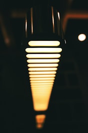 A close up of a street light in the dark