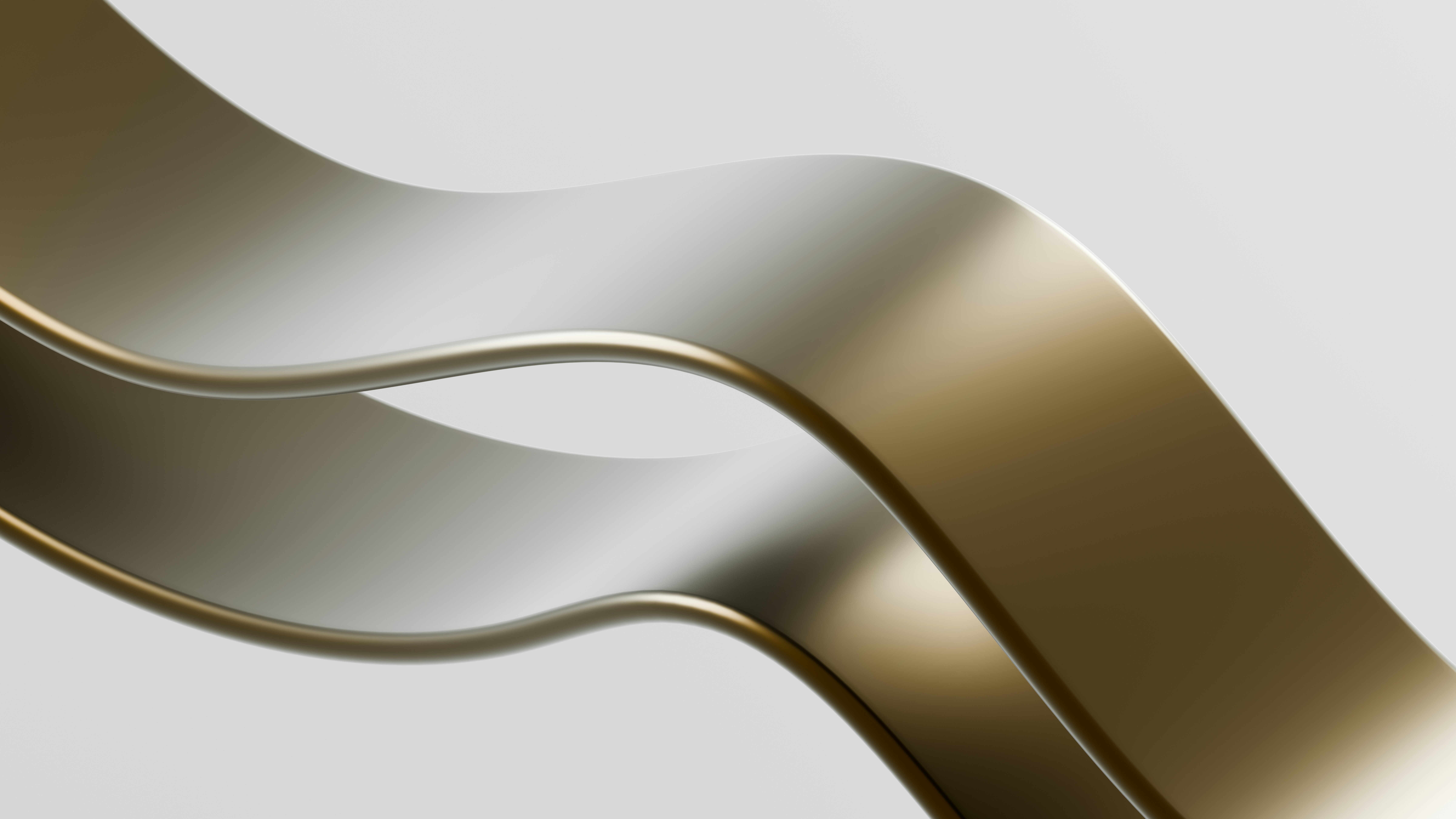 A close up of a gold and silver object