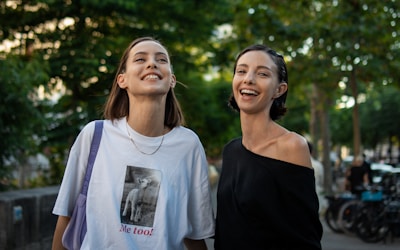 A couple of women standing next to each other