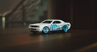 A toy car that is sitting on a table