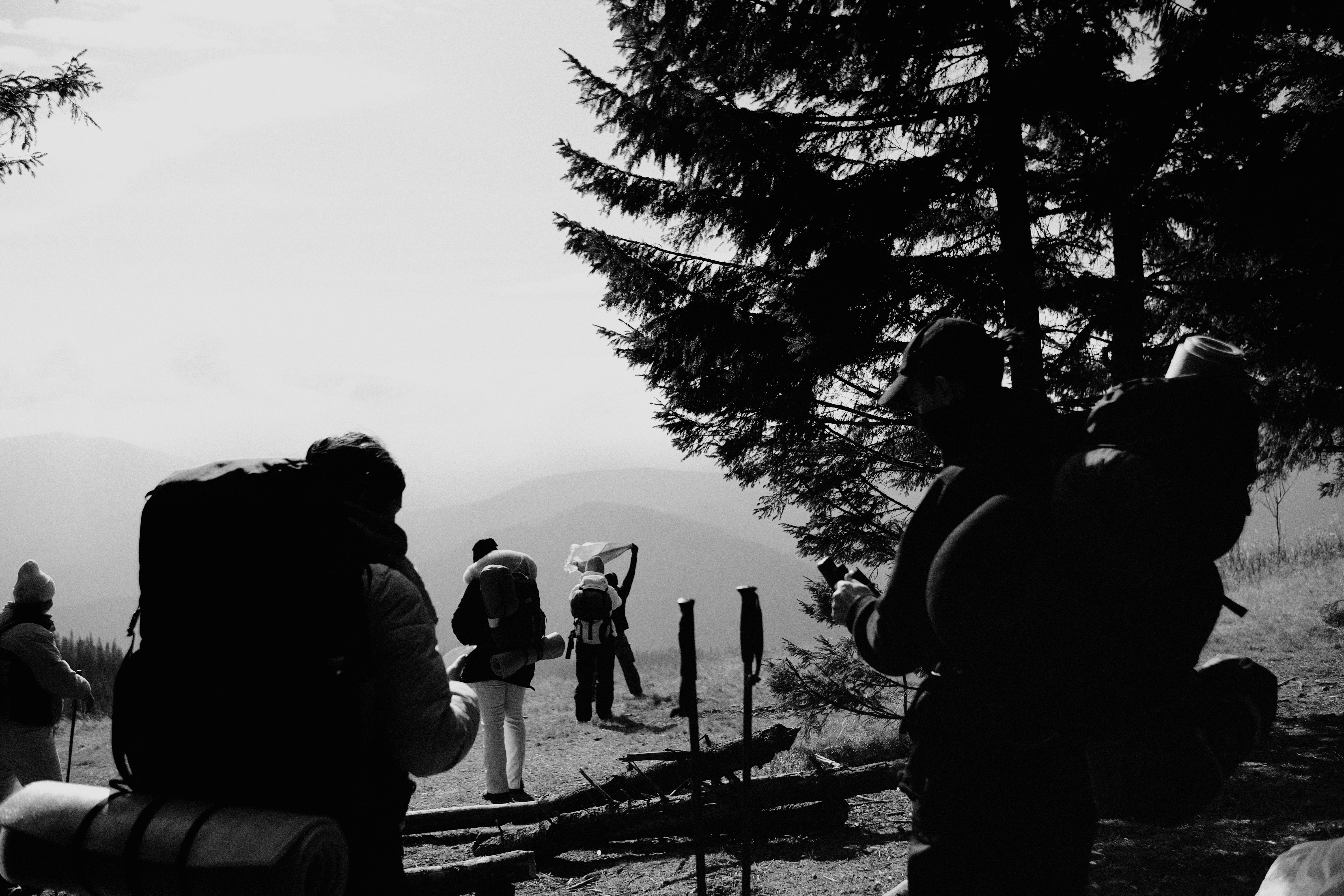 A black and white photo of a group of people