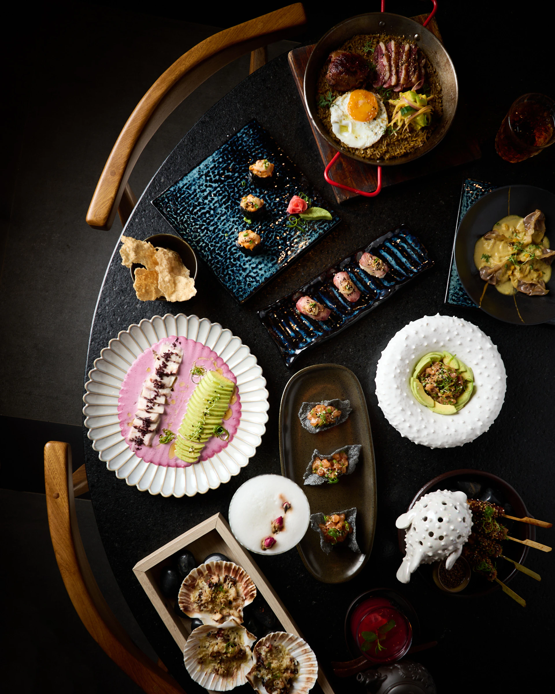 A table topped with lots of different types of food