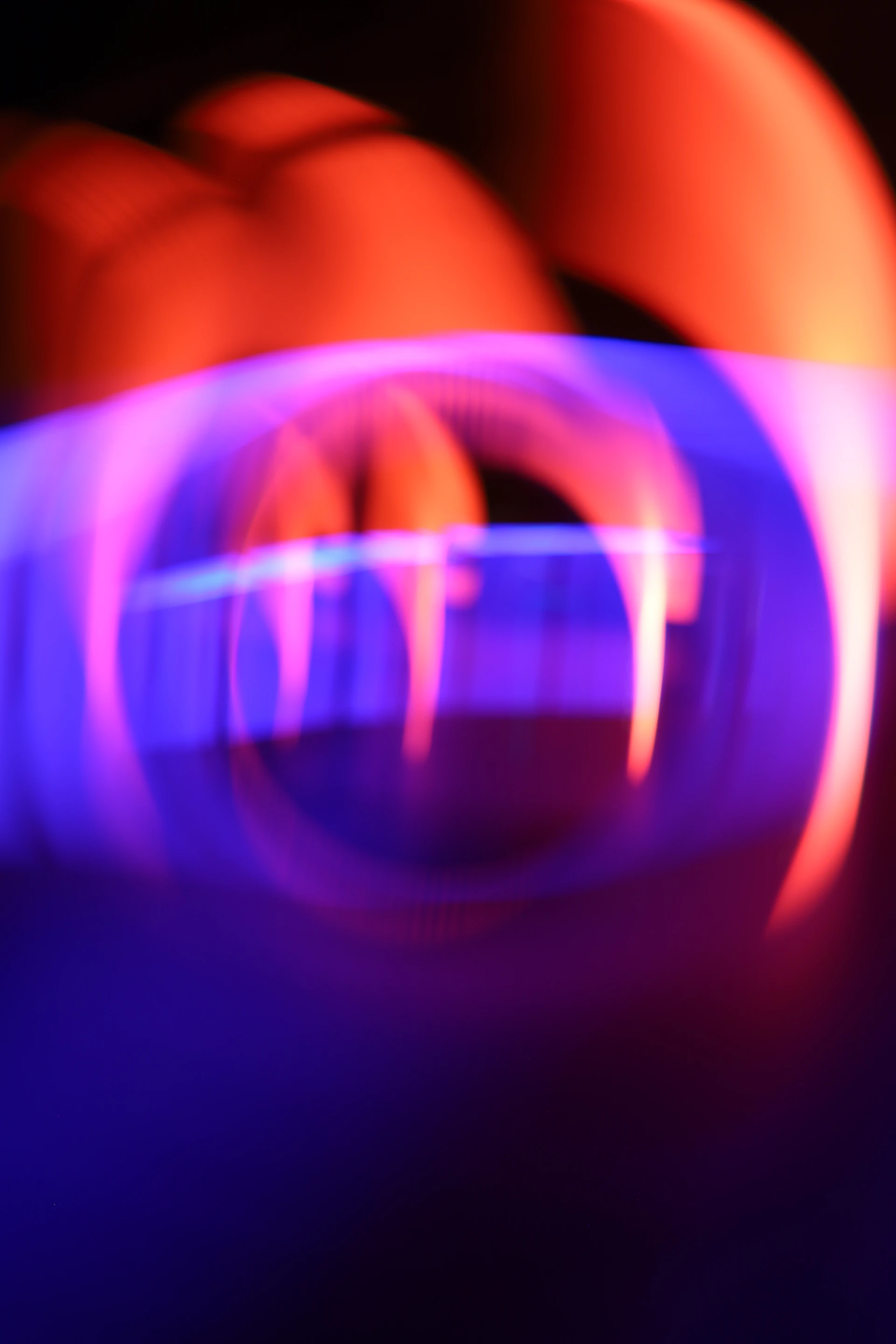 A blurry photo of a neon colored object