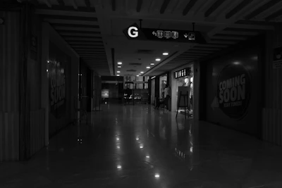 A black and white photo of a hallway