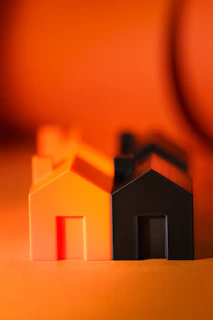 A couple of houses sitting on top of a table
