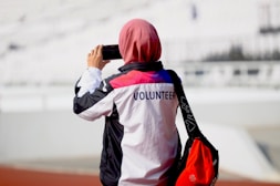 A woman taking a picture with her cell phone
