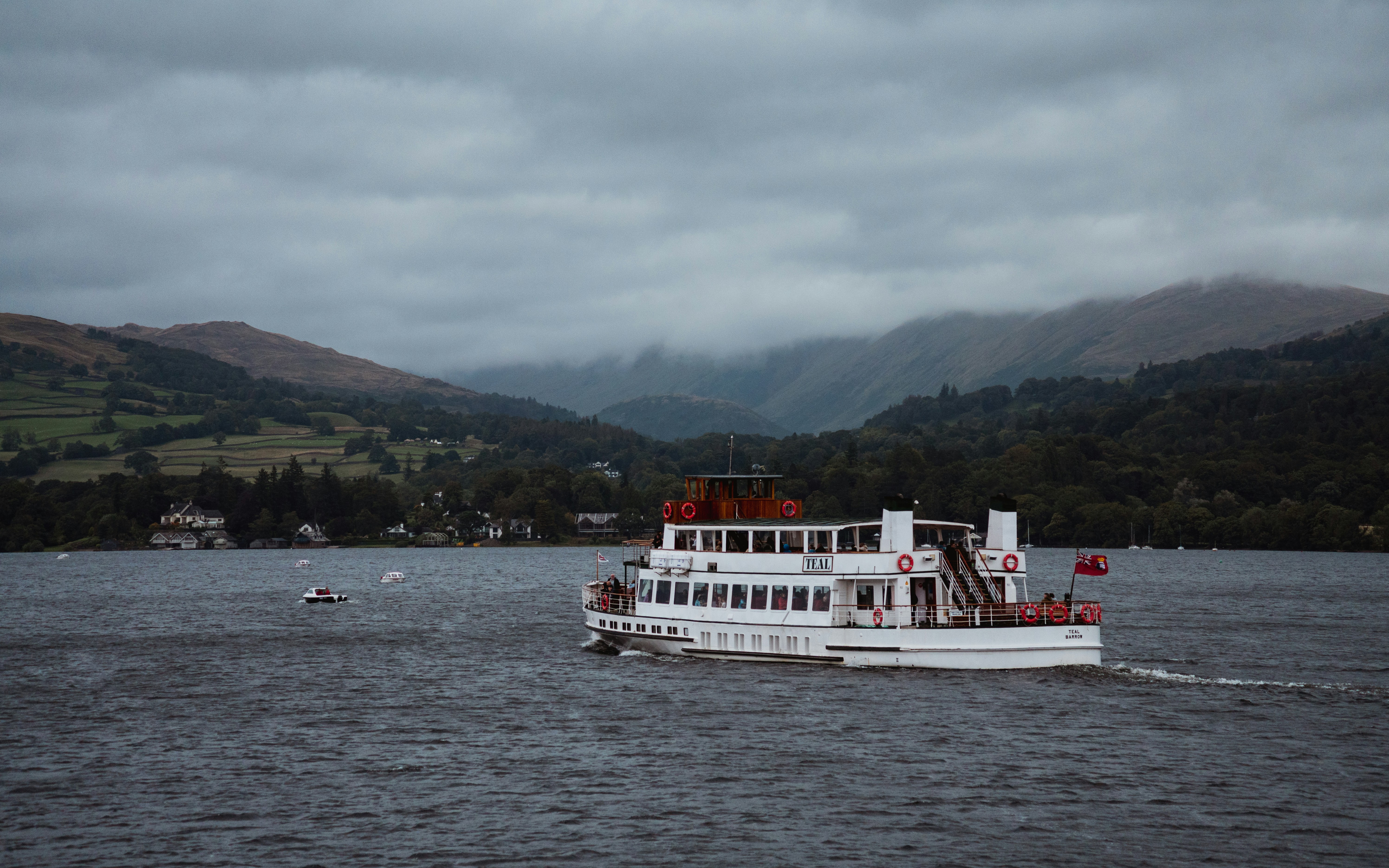 A large white boat on a large body of water