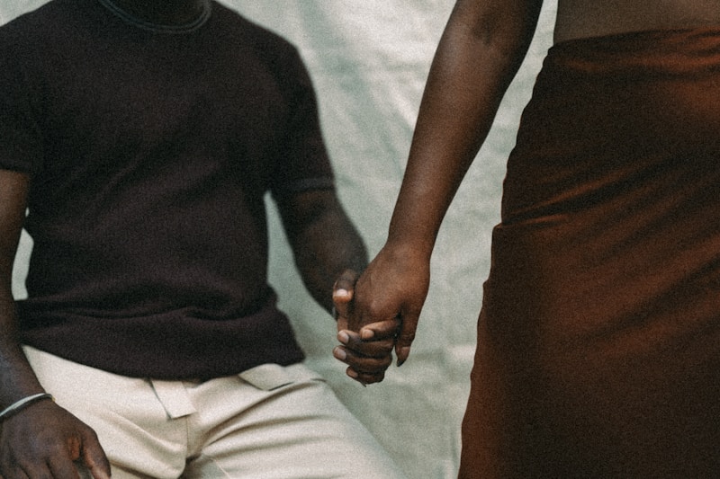 A man and a woman holding hands