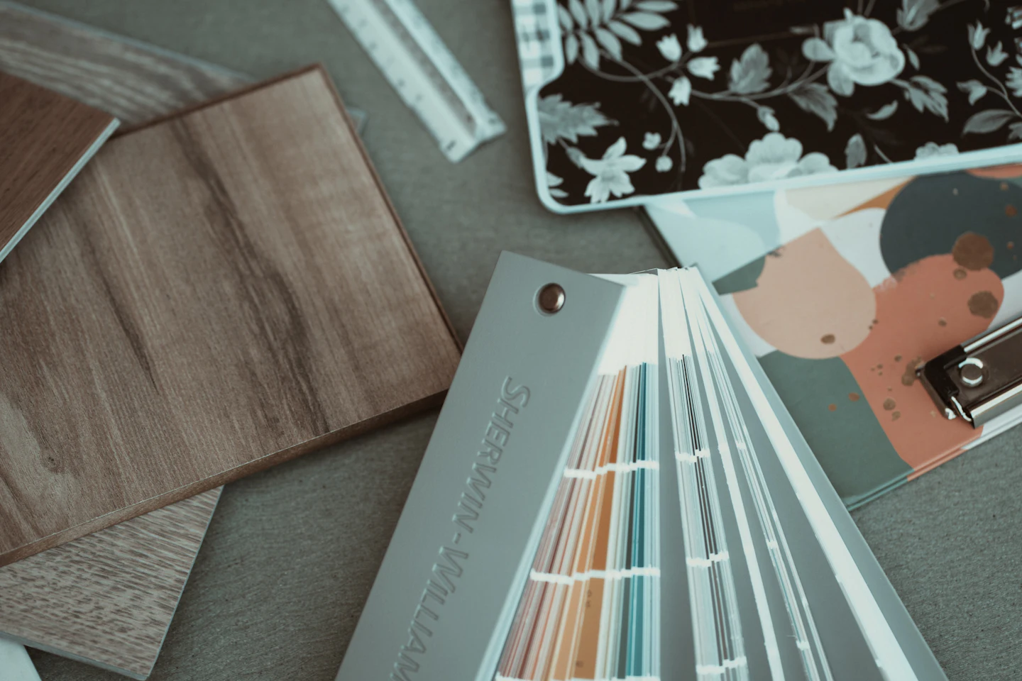 Fabric and finish swatch cards spread on a table