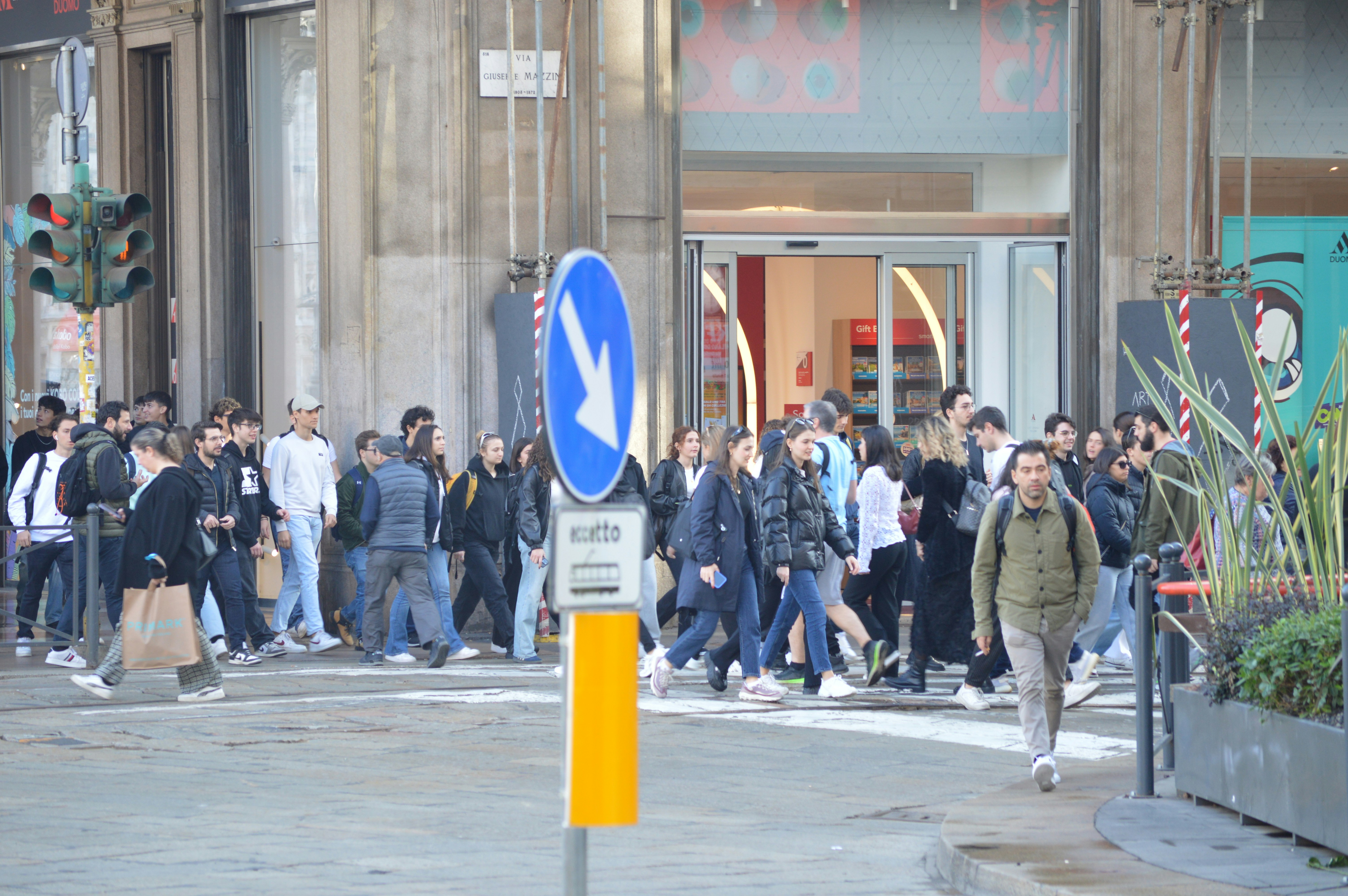 Fireworks fly as hooded protesters clash with police after Olympics open in Milan