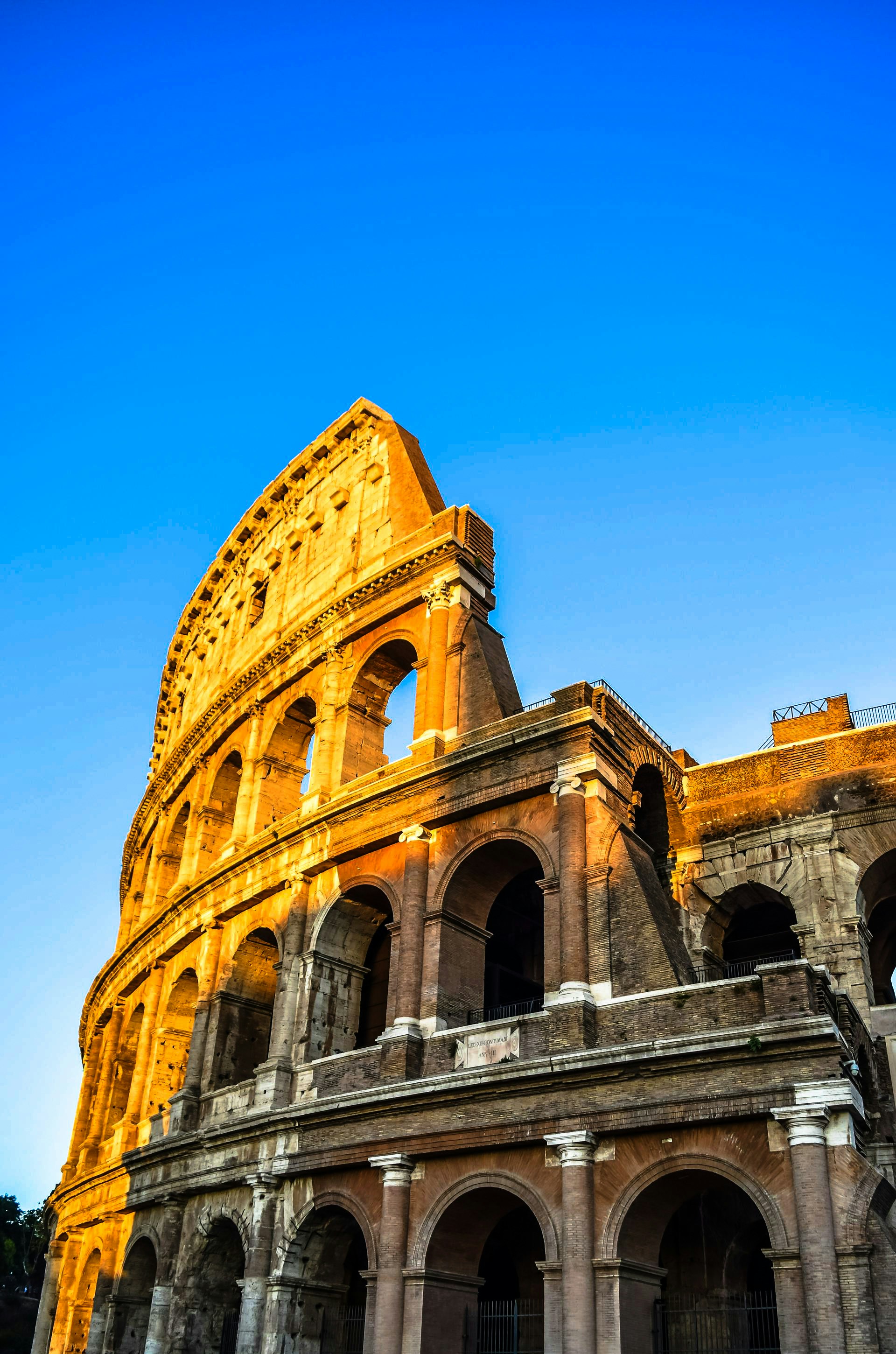 A large building with a very tall tower on top of it