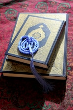 A book with a tassel on top of it