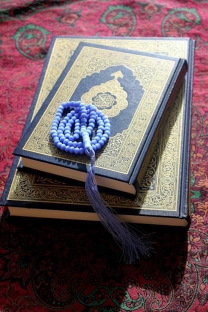 A book with a tassel on top of it